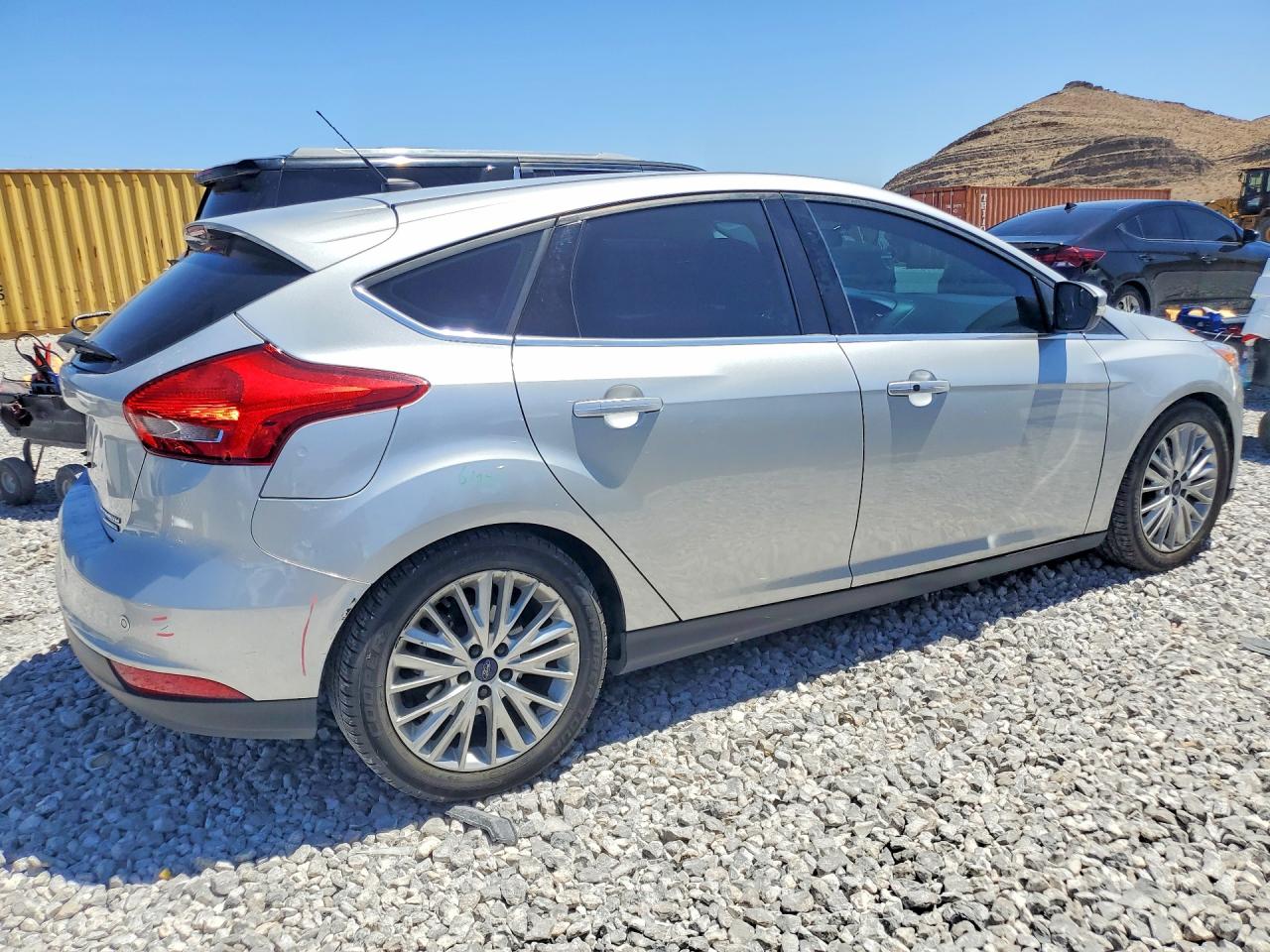 2015 Ford Focus Titanium Серебряный vin: 1FADP3N26FL385957