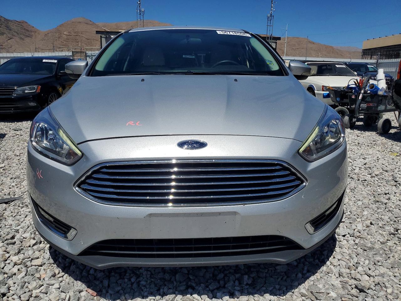 2015 Ford Focus Titanium Серебряный vin: 1FADP3N26FL385957