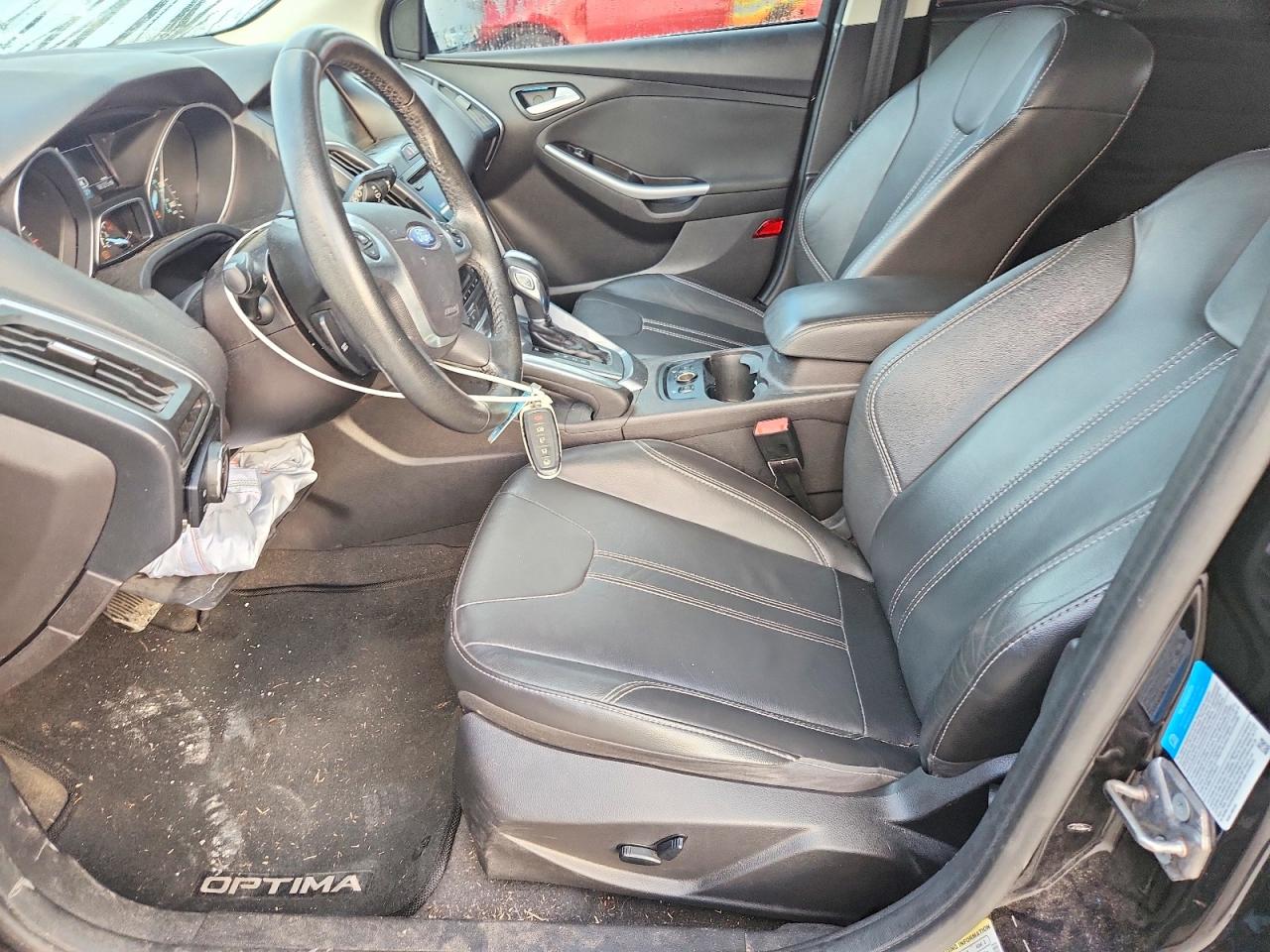 2013 Ford Focus Titanium Black vin: 1FADP3N27DL317597