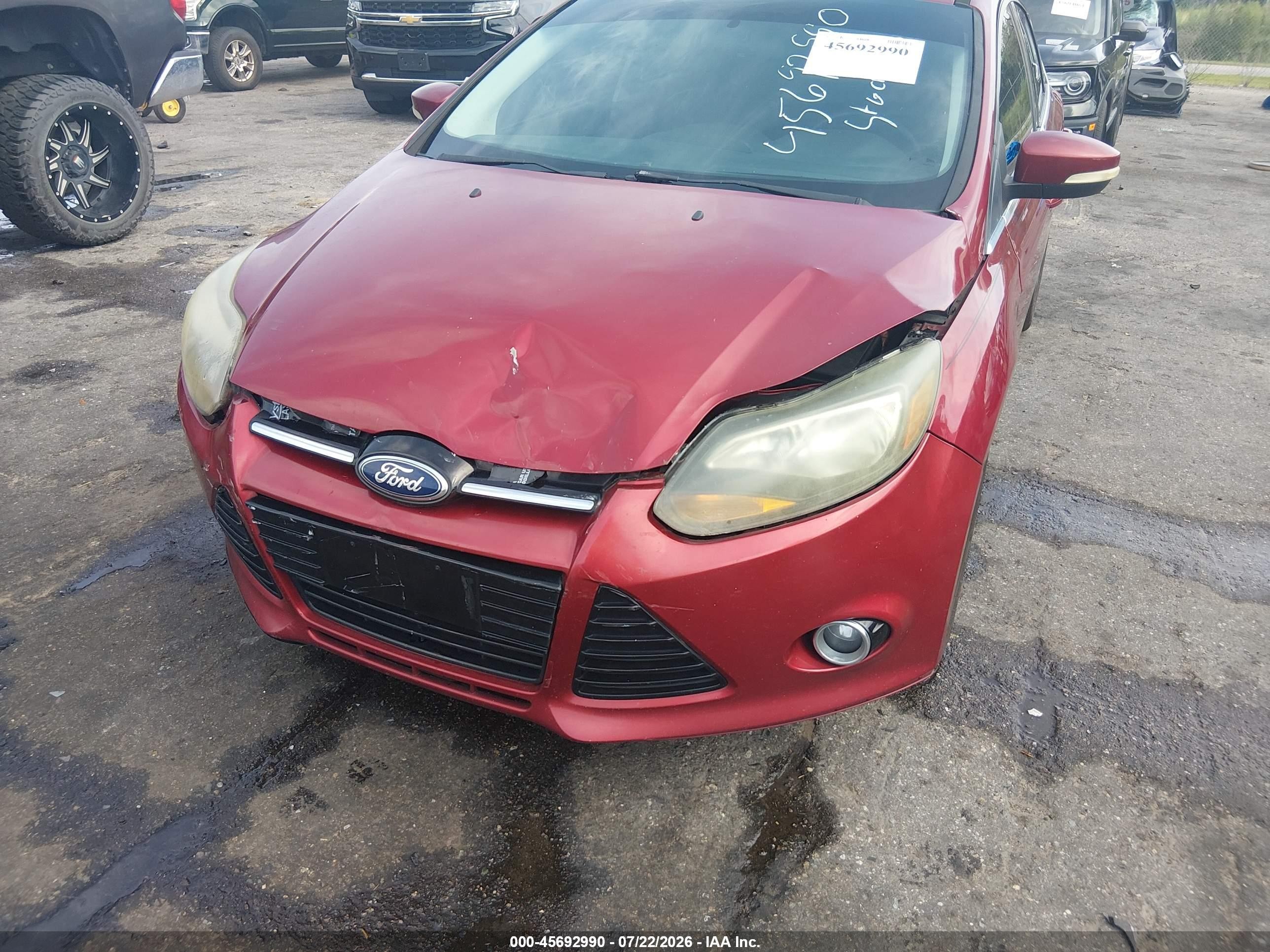 2014 Ford Focus Titanium Red vin: 1FADP3N27EL104473