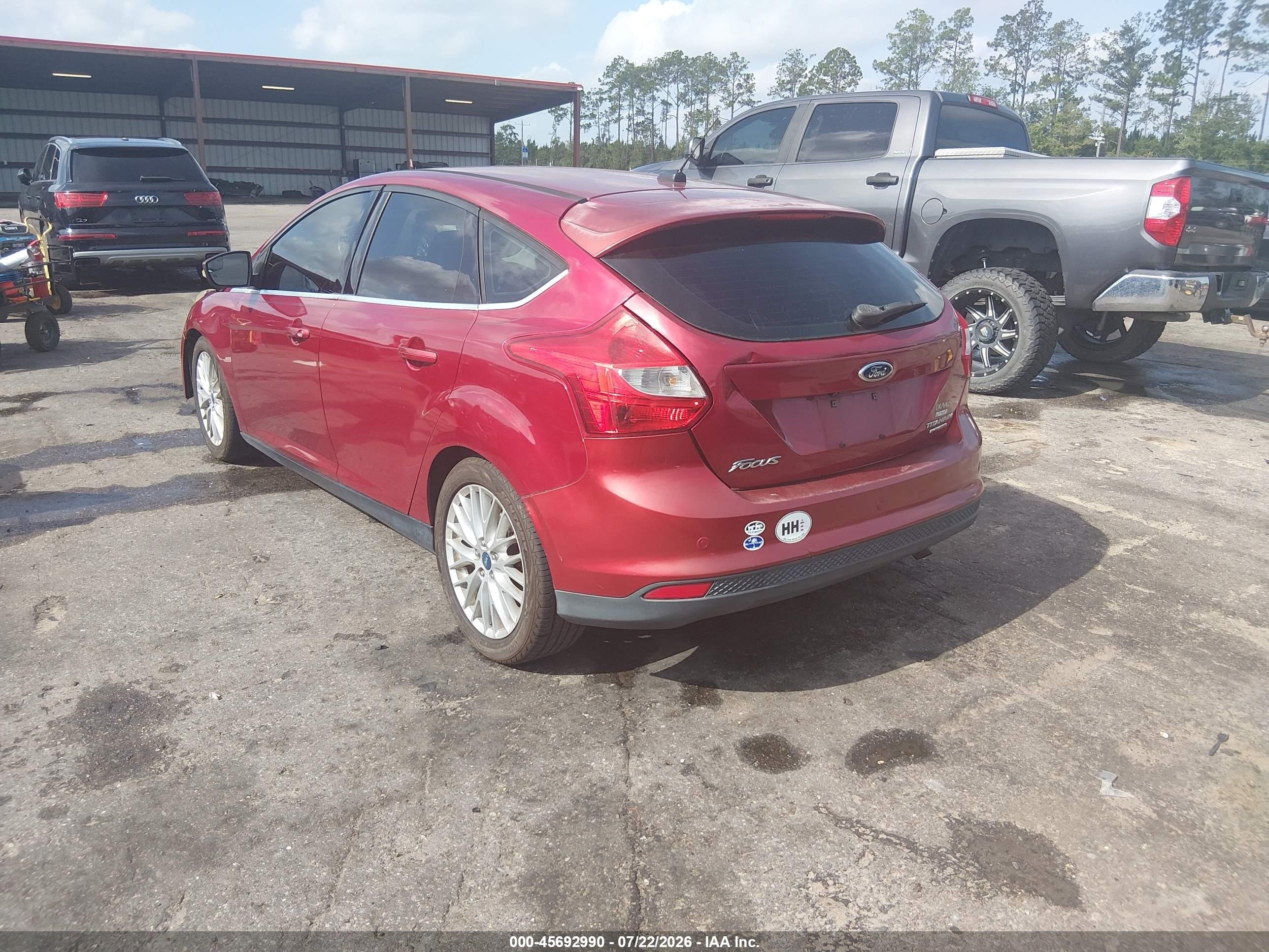 2014 Ford Focus Titanium Red vin: 1FADP3N27EL104473