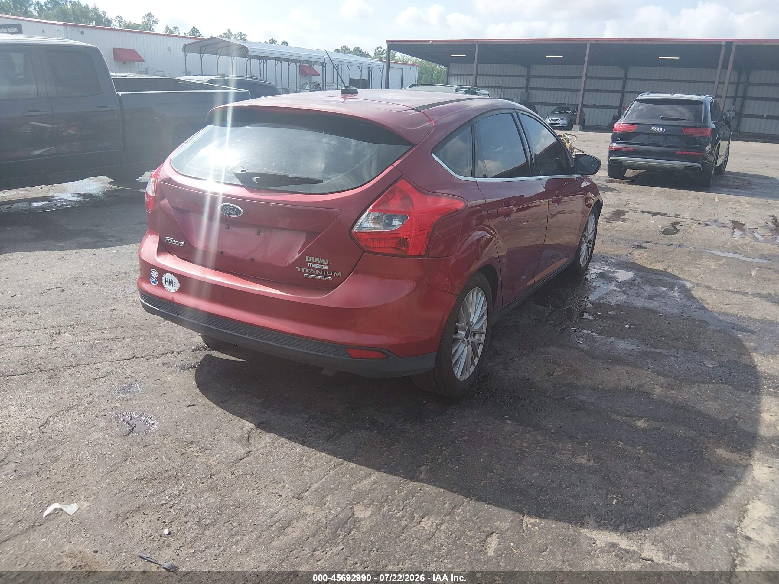 2014 Ford Focus Titanium Red vin: 1FADP3N27EL104473
