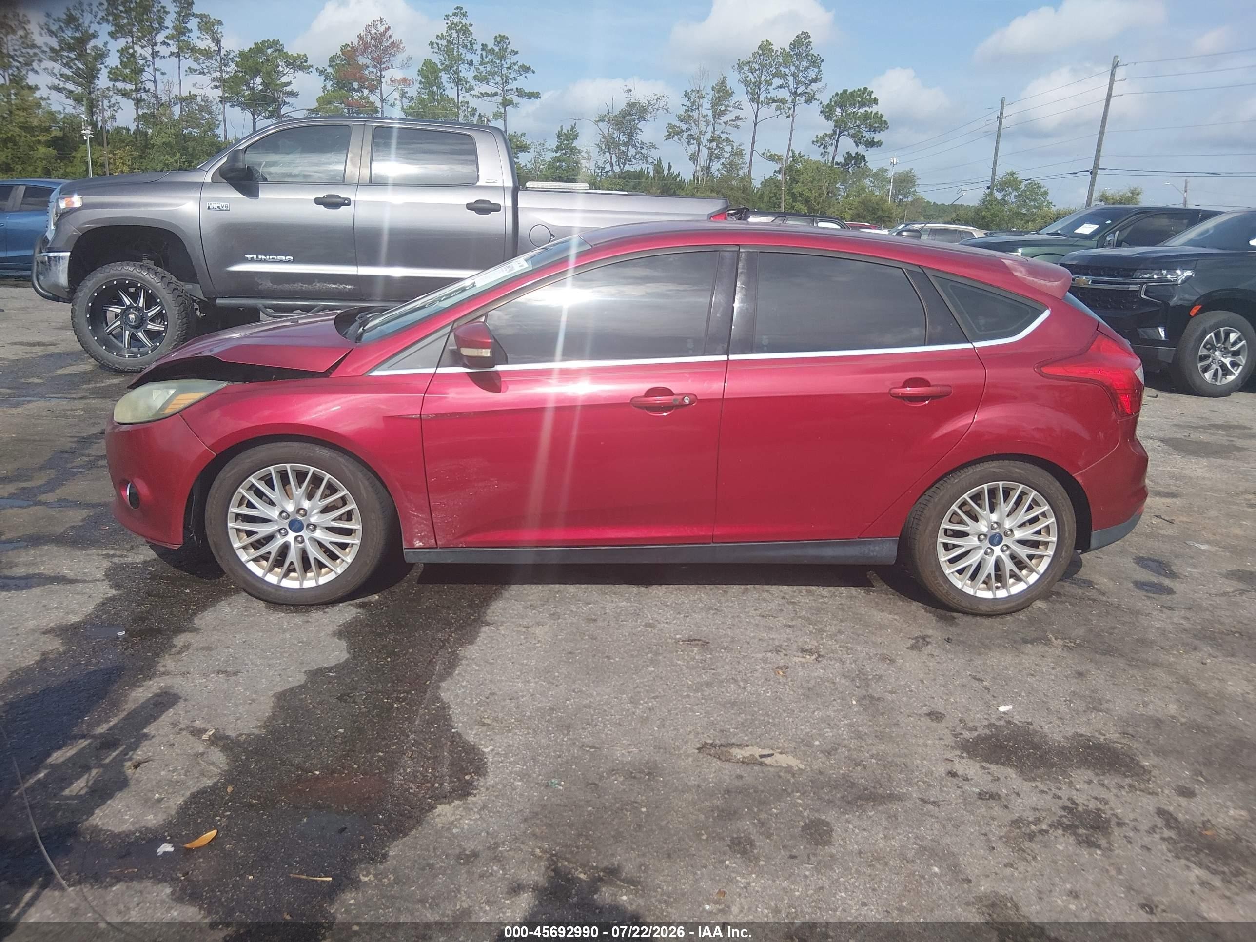 2014 Ford Focus Titanium Red vin: 1FADP3N27EL104473