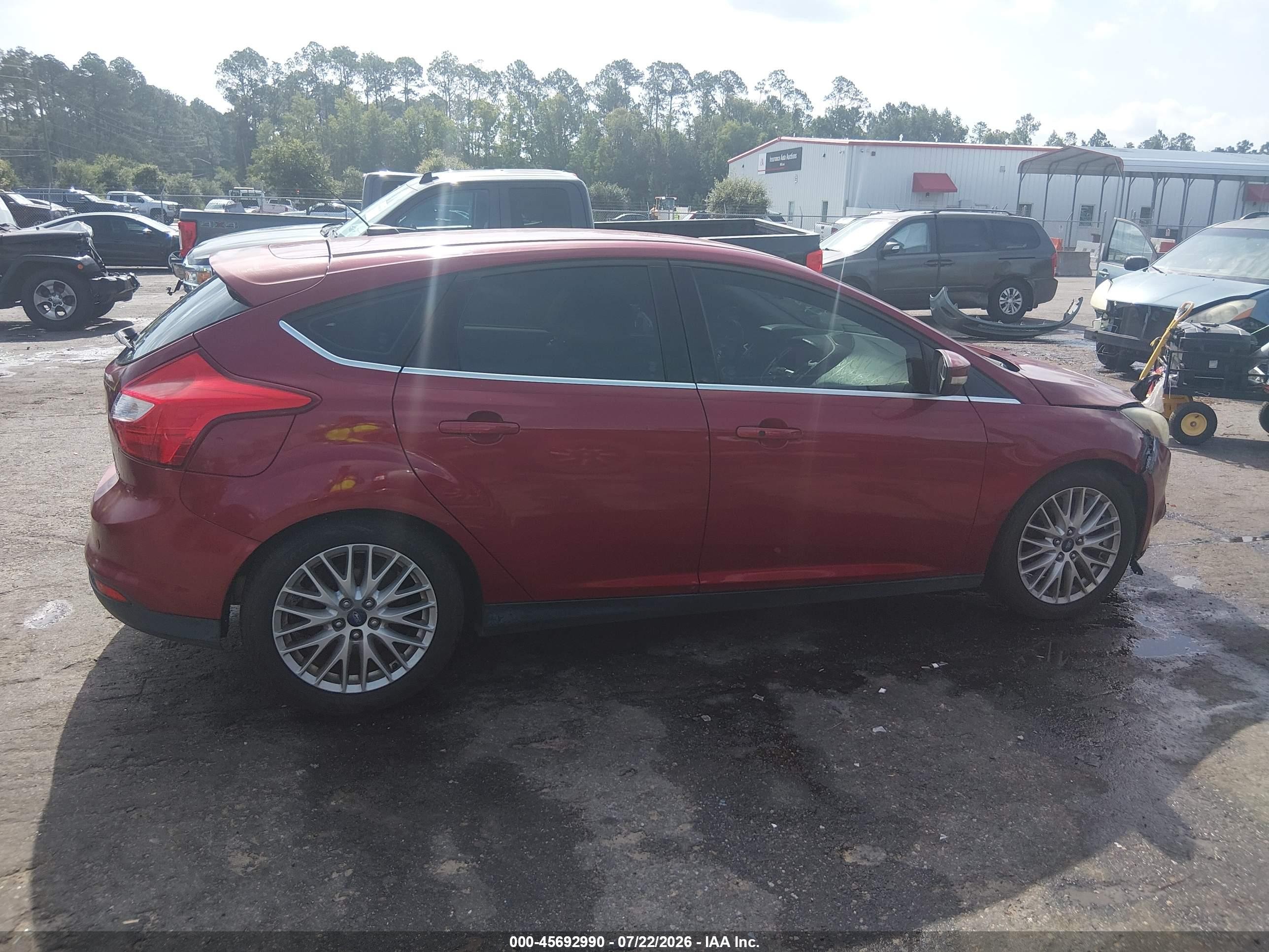 2014 Ford Focus Titanium Red vin: 1FADP3N27EL104473