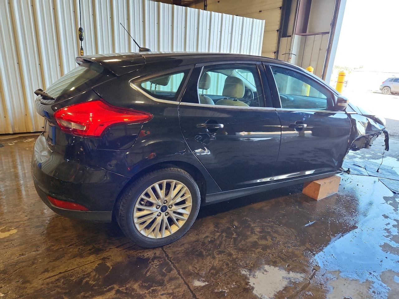 2015 Ford Focus Titanium Black vin: 1FADP3N27FL208754