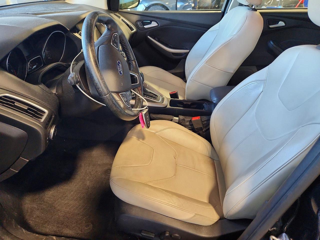 2015 Ford Focus Titanium Black vin: 1FADP3N27FL208754