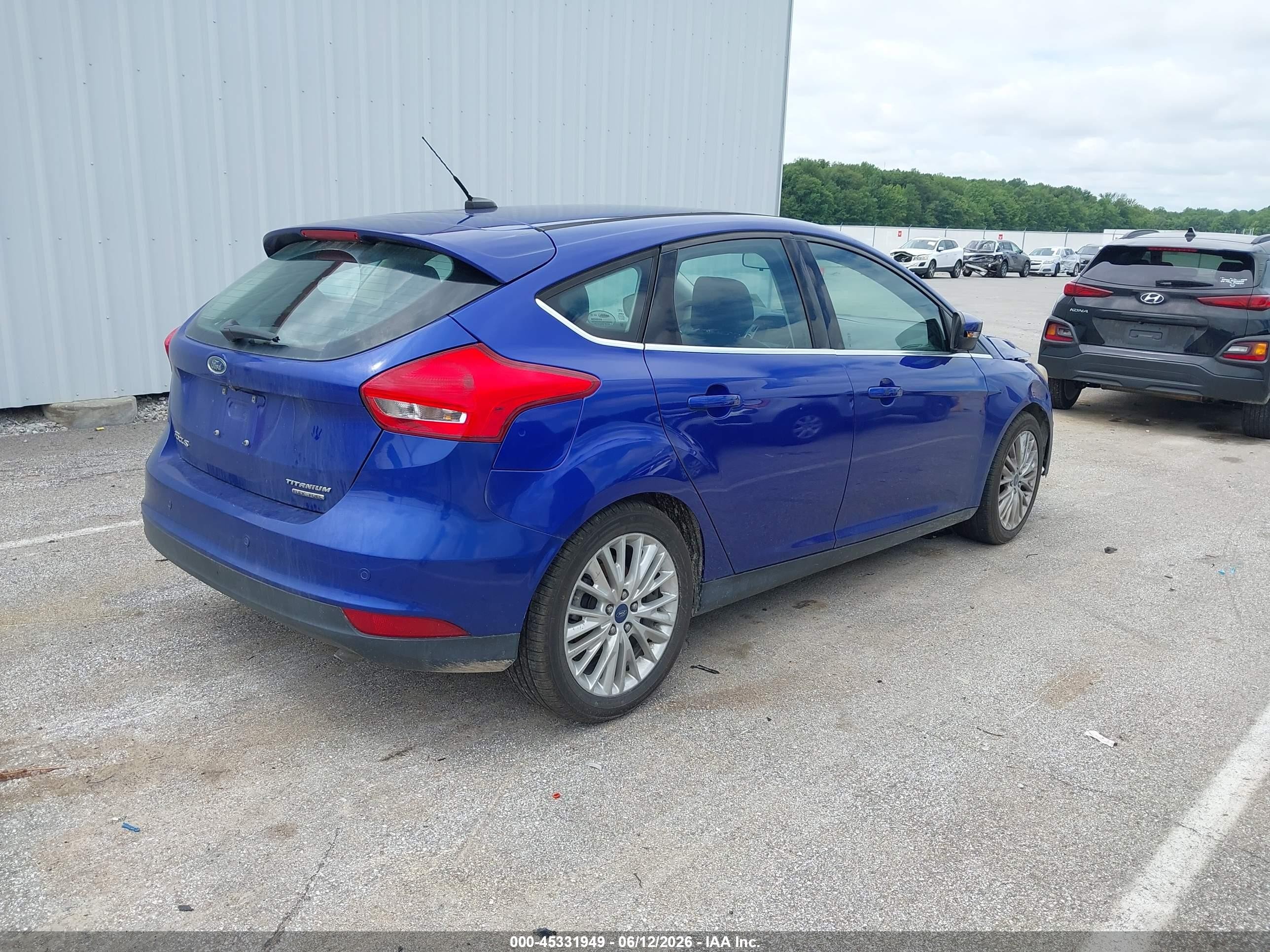 2015 Ford Focus Titanium Blue vin: 1FADP3N27FL252706
