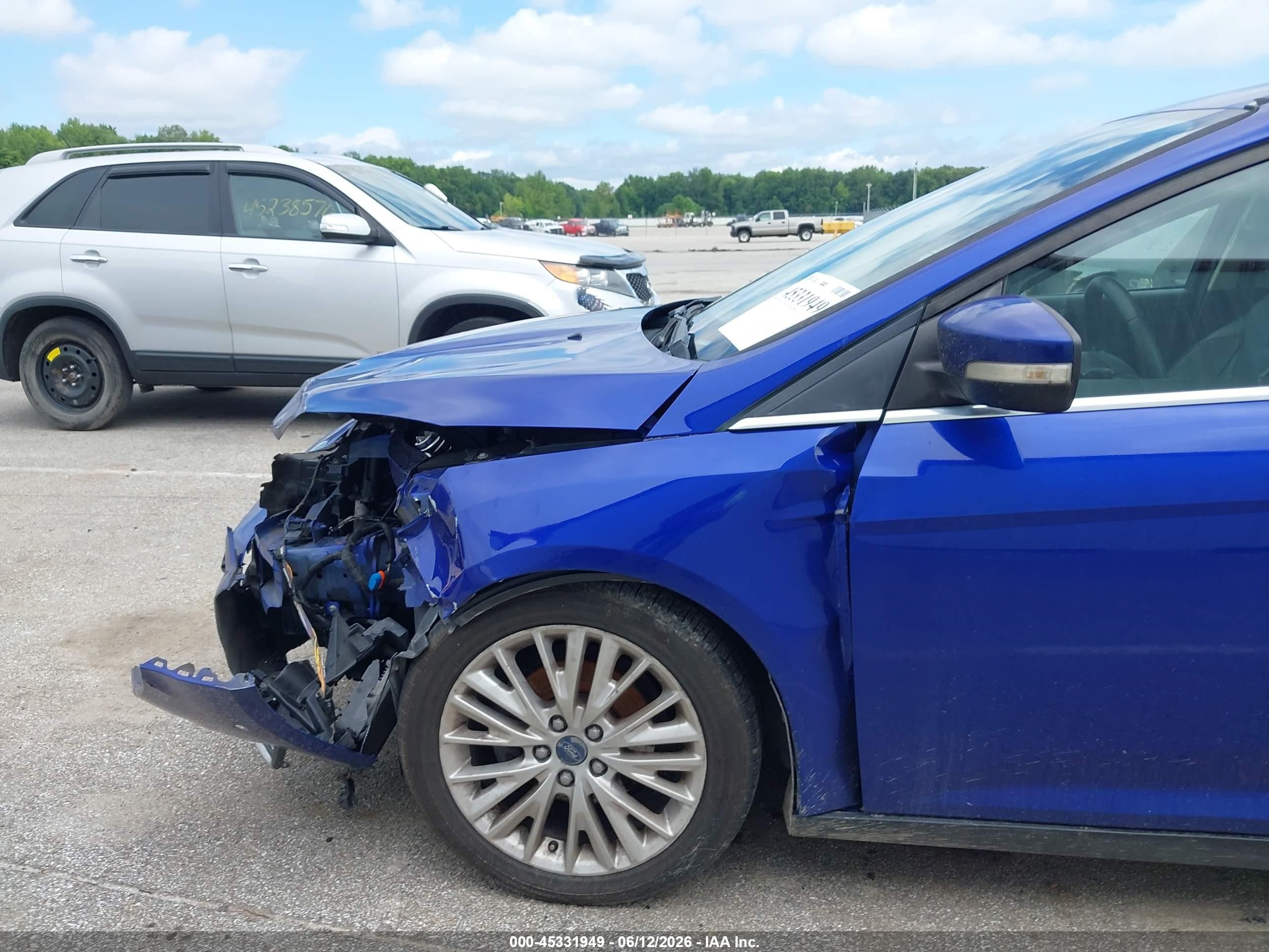 2015 Ford Focus Titanium Blue vin: 1FADP3N27FL252706