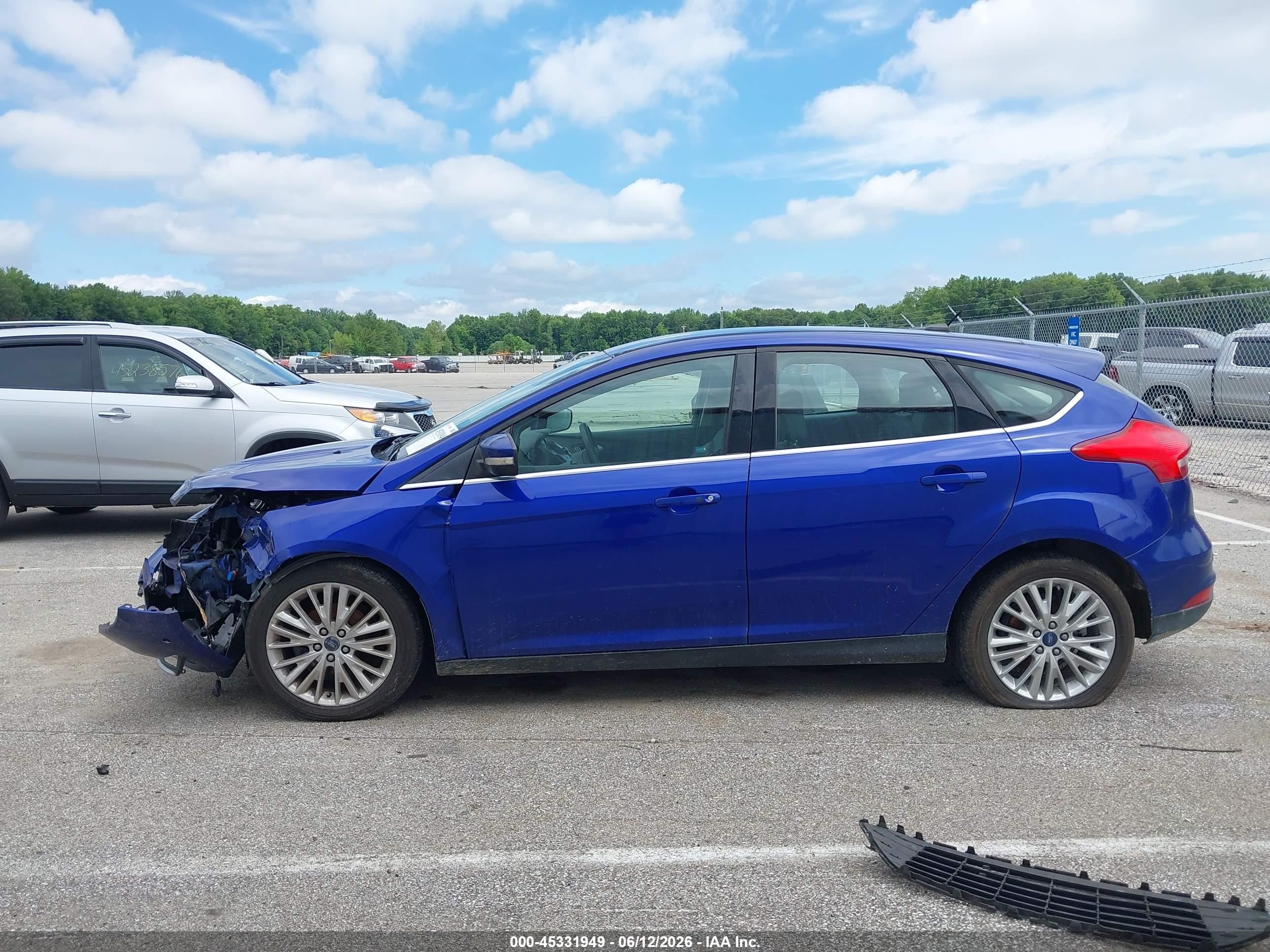 2015 Ford Focus Titanium Blue vin: 1FADP3N27FL252706