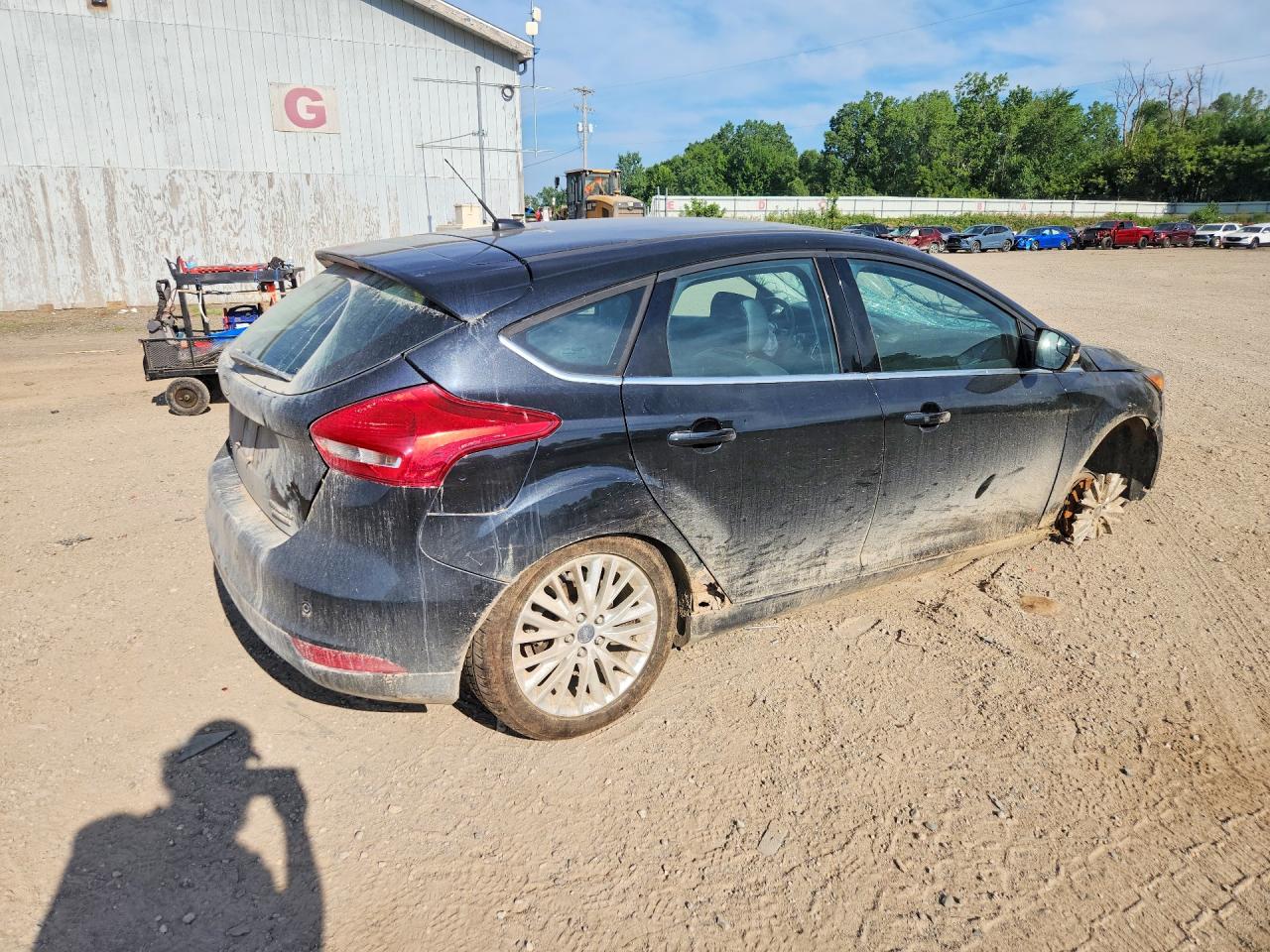 2015 Ford Focus Titanium Black vin: 1FADP3N28FL333942