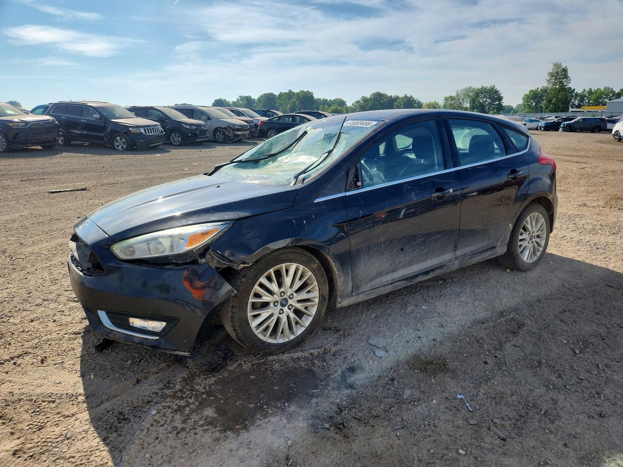 2015 Ford Focus Titanium Black vin: 1FADP3N28FL333942