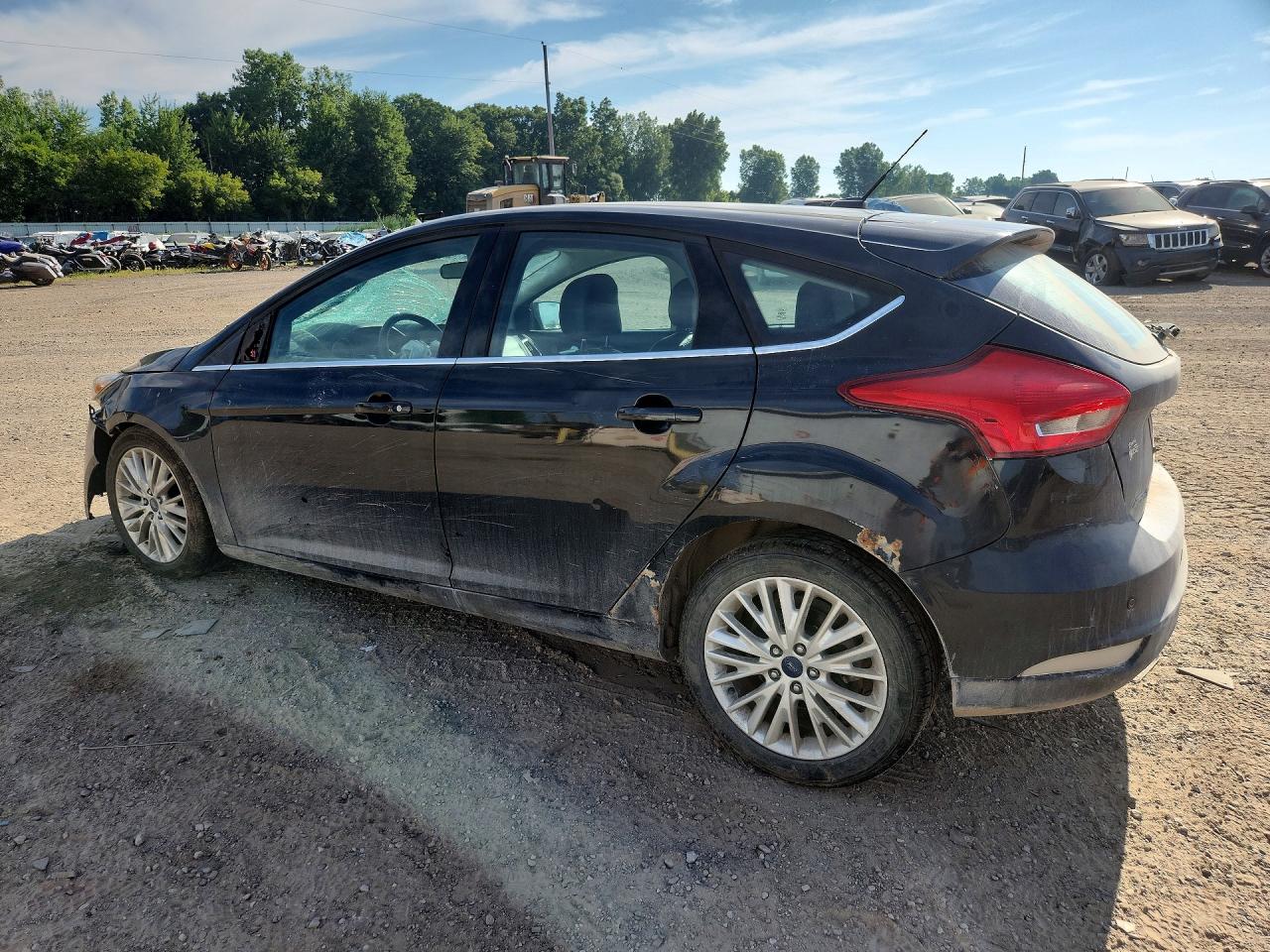 2015 Ford Focus Titanium Black vin: 1FADP3N28FL333942