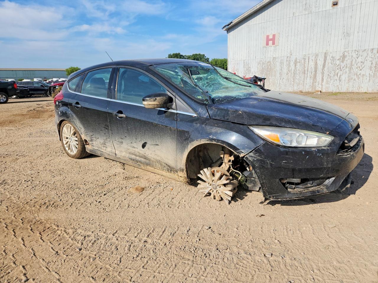 2015 Ford Focus Titanium Black vin: 1FADP3N28FL333942