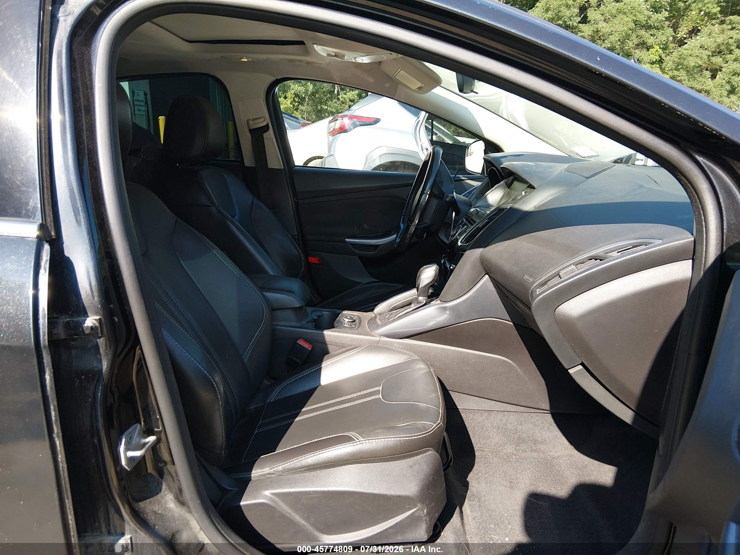 2014 Ford Focus Titanium Black vin: 1FADP3N29EL167641