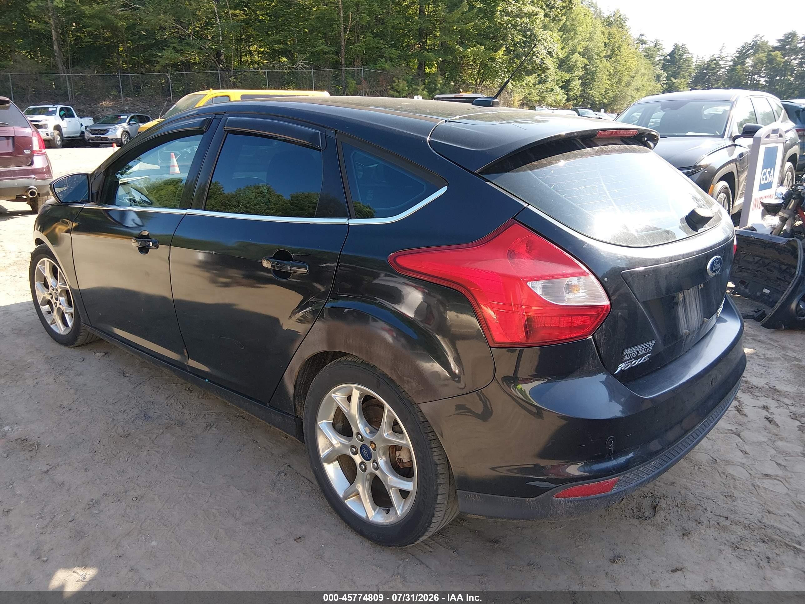 2014 Ford Focus Titanium Black vin: 1FADP3N29EL167641