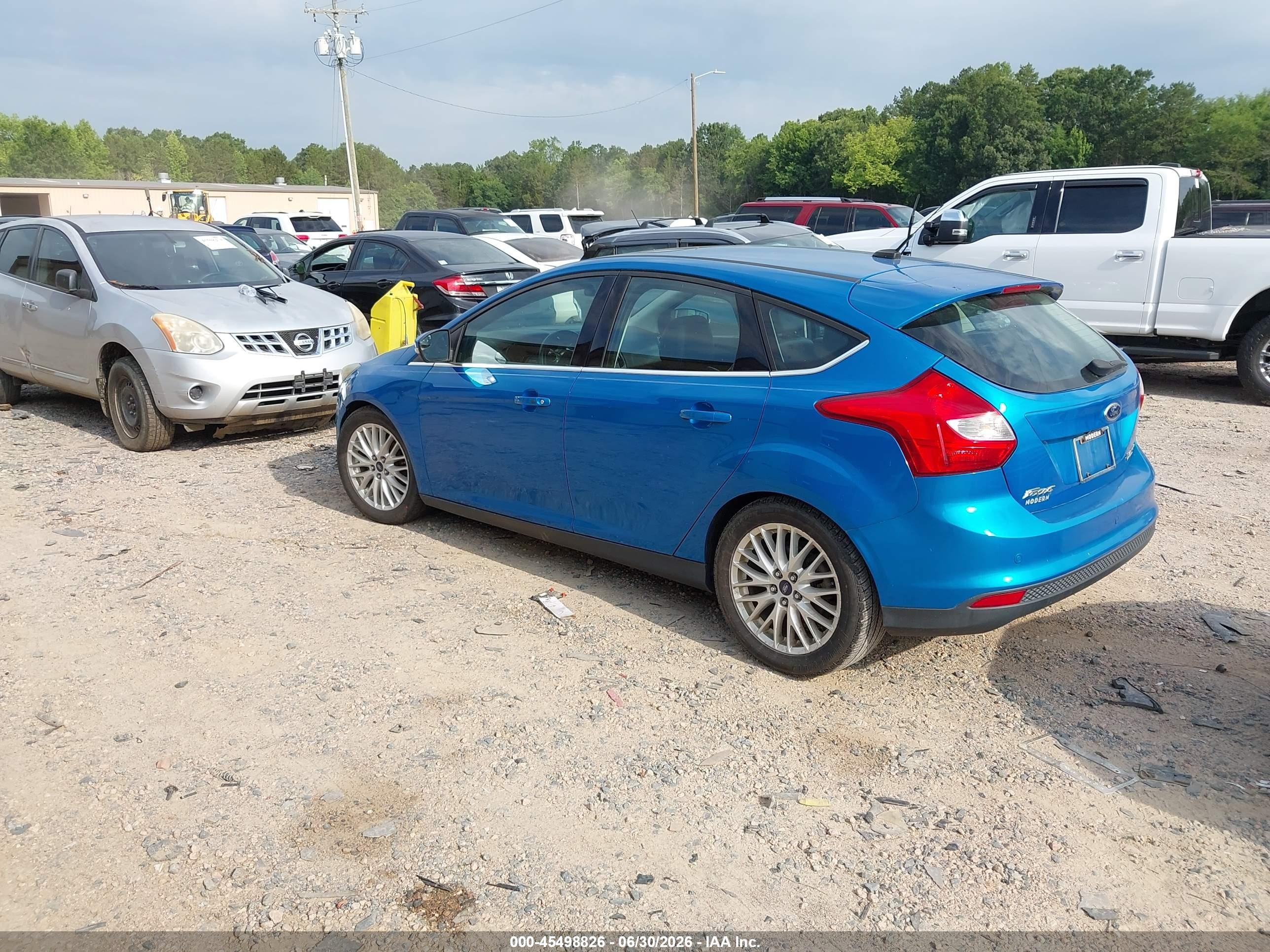 2014 Ford Focus Titanium Blue vin: 1FADP3N29EL228048