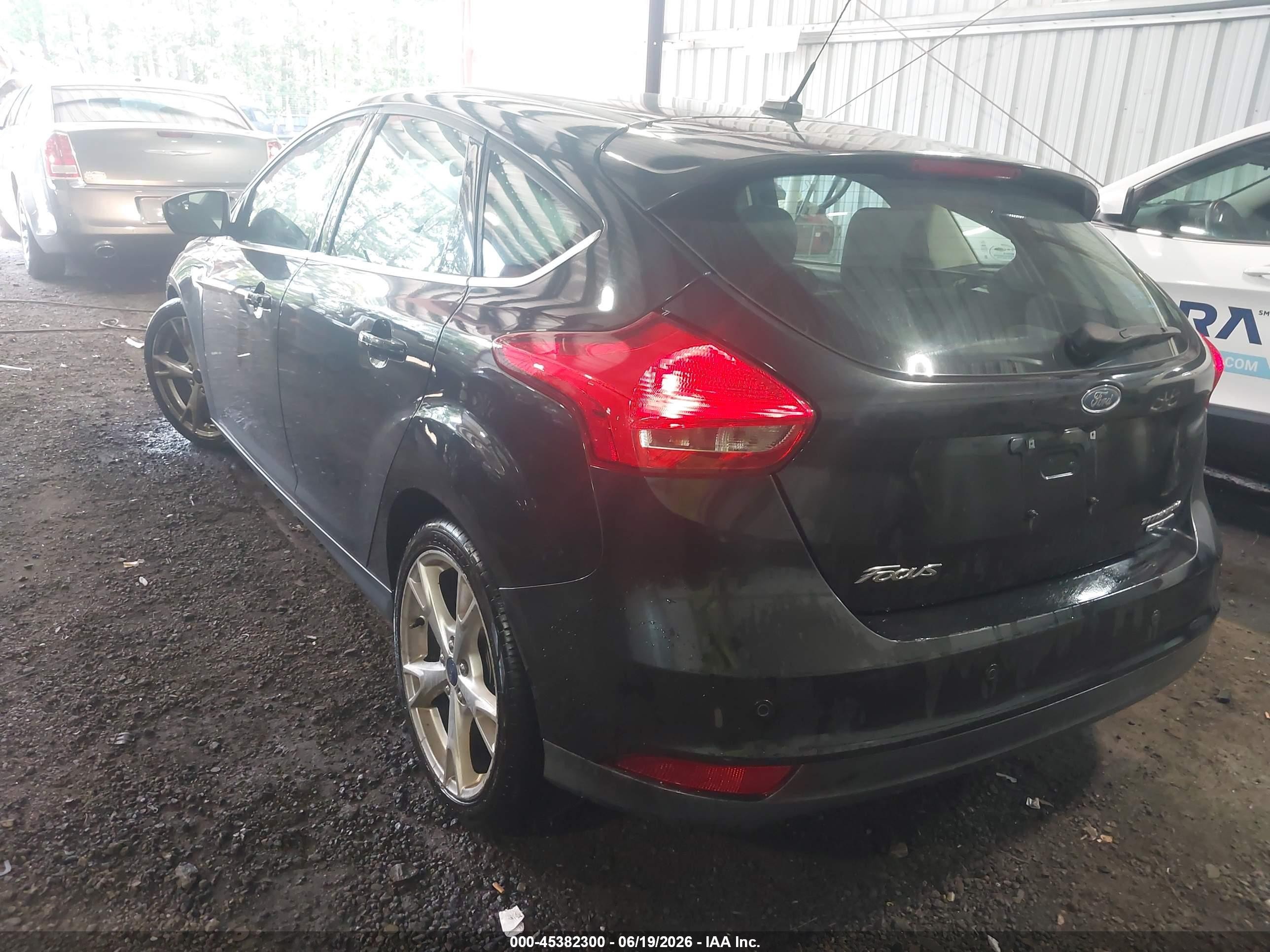 2015 Ford Focus Titanium Черный vin: 1FADP3N29FL304904