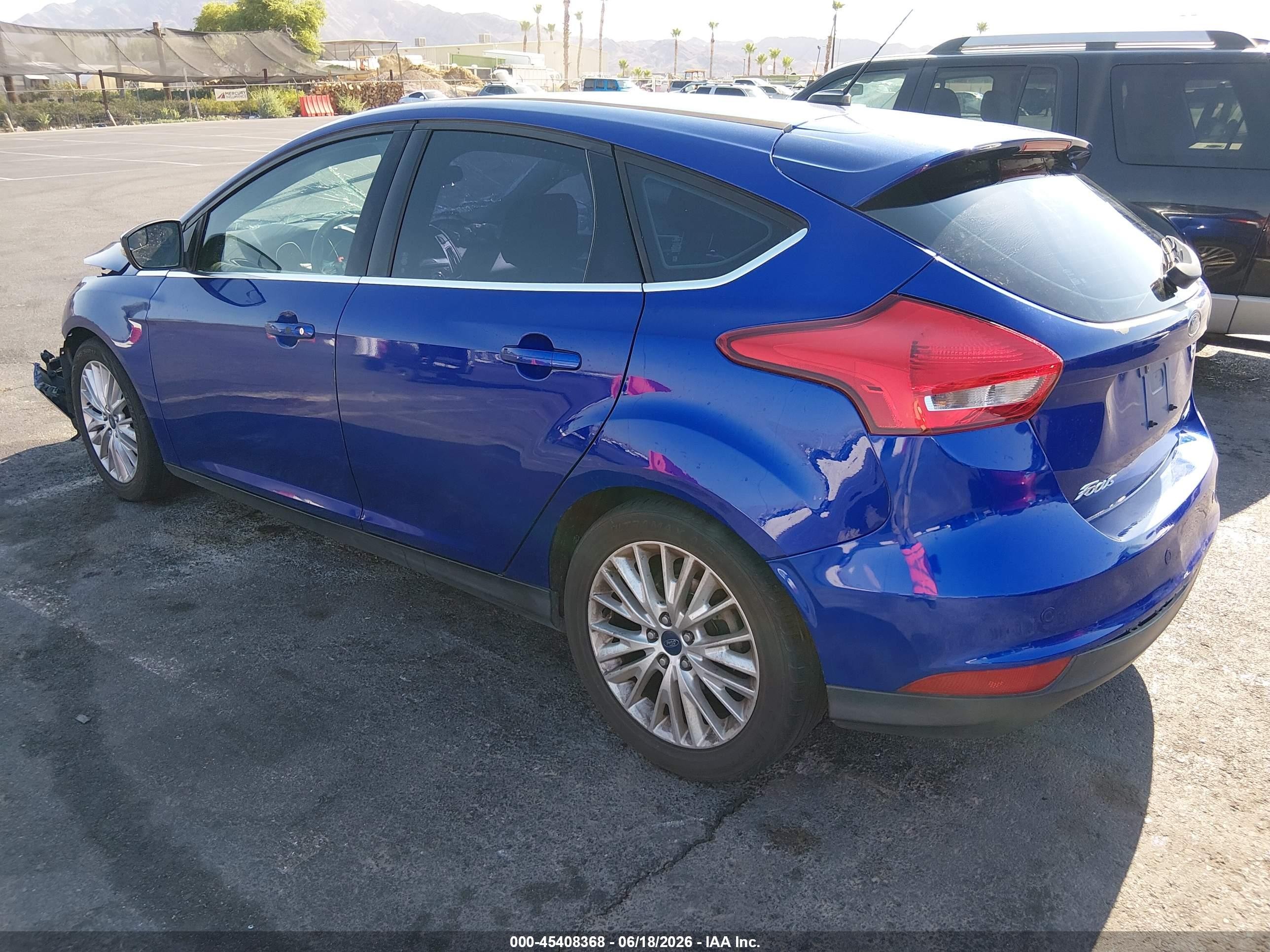 2015 Ford Focus Titanium Blue vin: 1FADP3N29FL341452