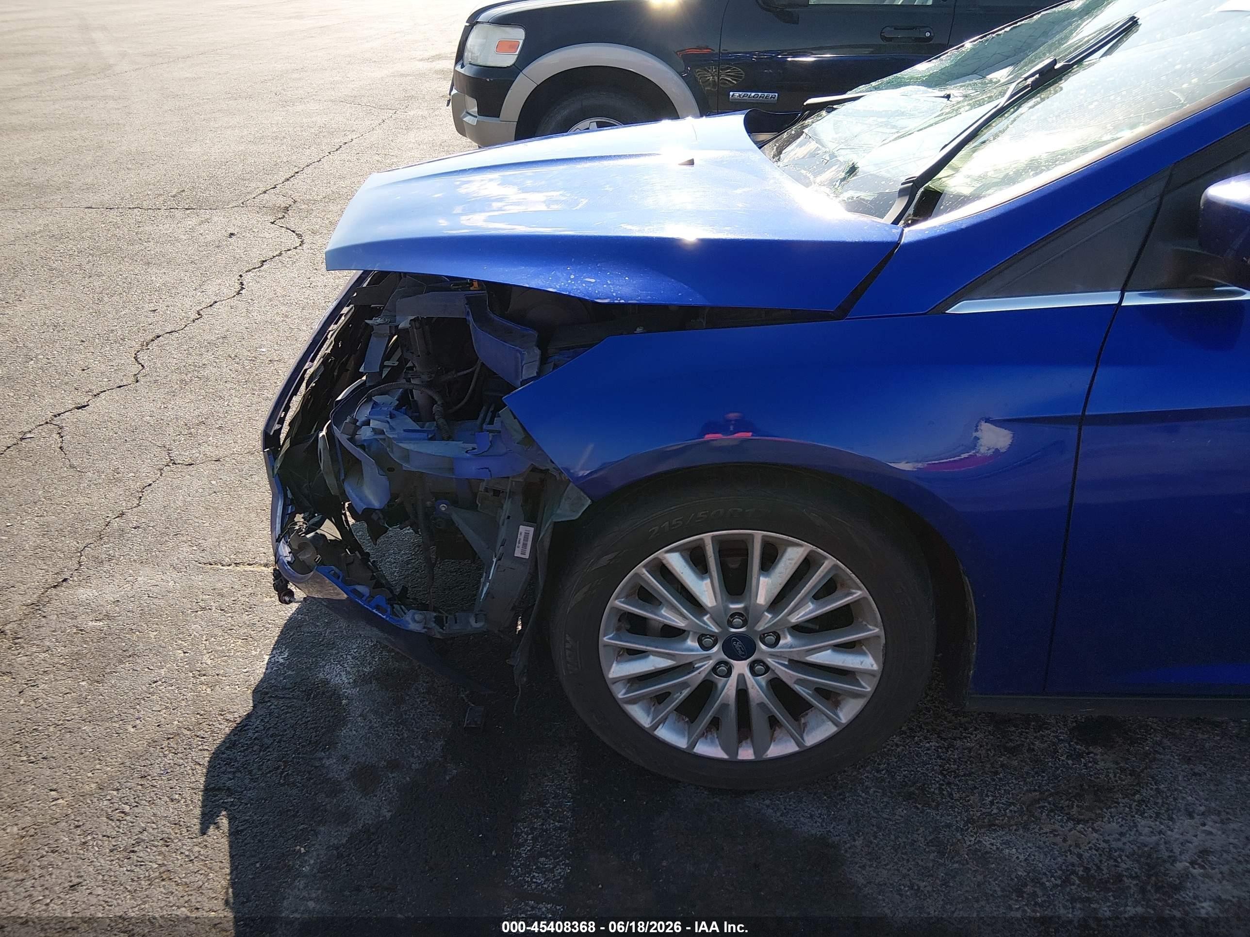 2015 Ford Focus Titanium Blue vin: 1FADP3N29FL341452