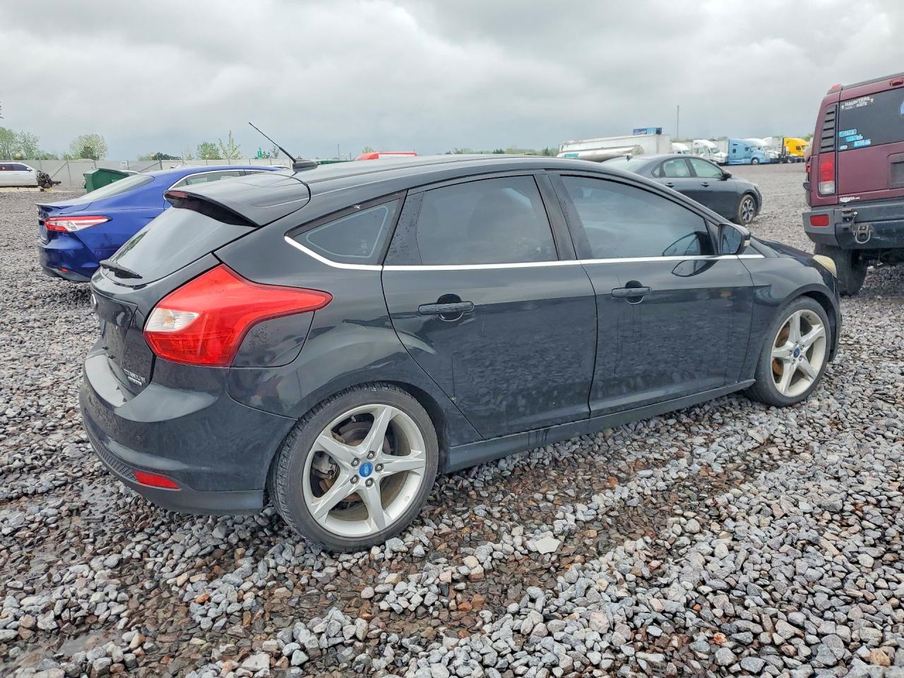2014 Ford Focus Titanium Black vin: 1FADP3N2XEL253122