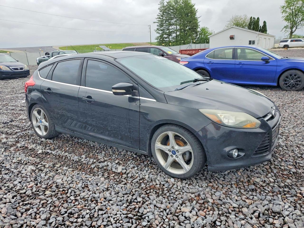 2014 Ford Focus Titanium Black vin: 1FADP3N2XEL253122