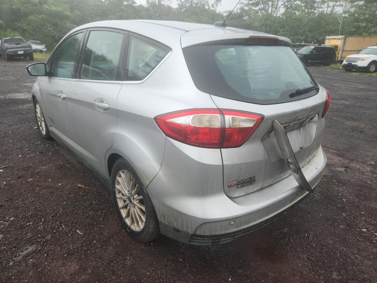 2013 Ford C-max Premium Silver vin: 1FADP5CU0DL545165 Damage: Left Qtr Panel, Dent(S) W/No Paint Dmg, 1 To 2 Inches