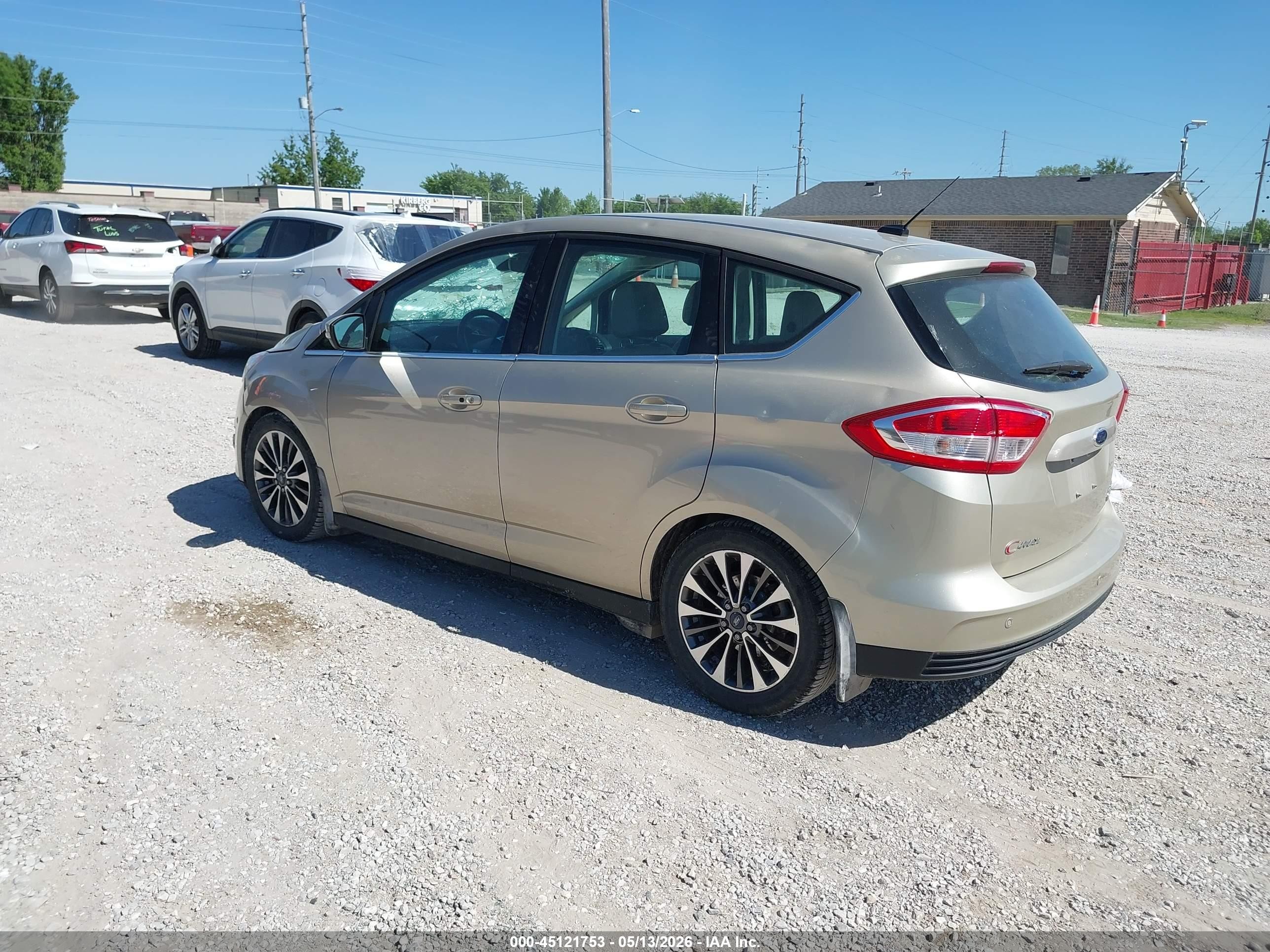 2017 Ford C-max Hybrid Titanium Champagne vin: 1FADP5DU7HL114441