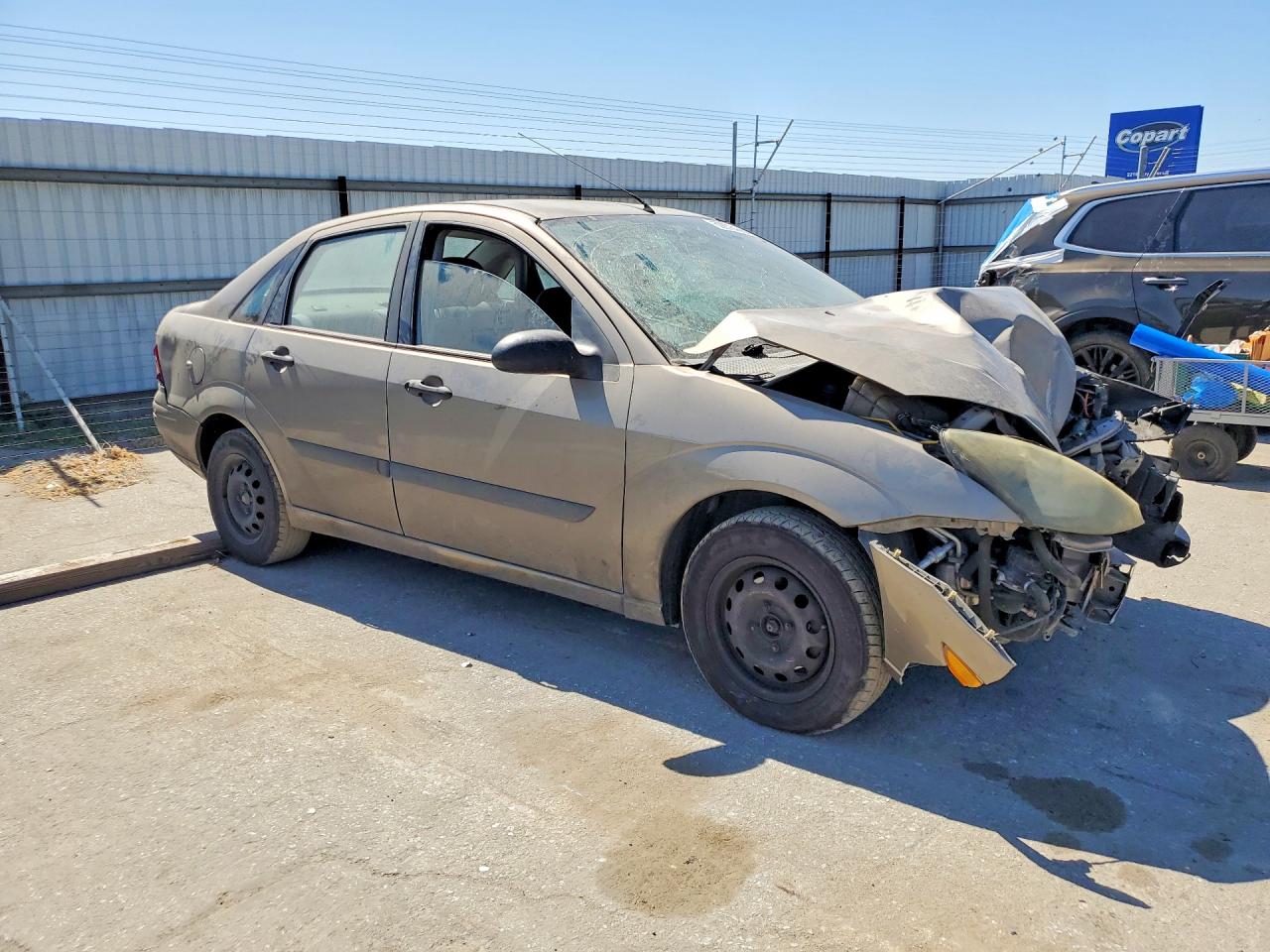 2004 Ford Focus Lx Gold vin: 1FAFP33Z44W188788