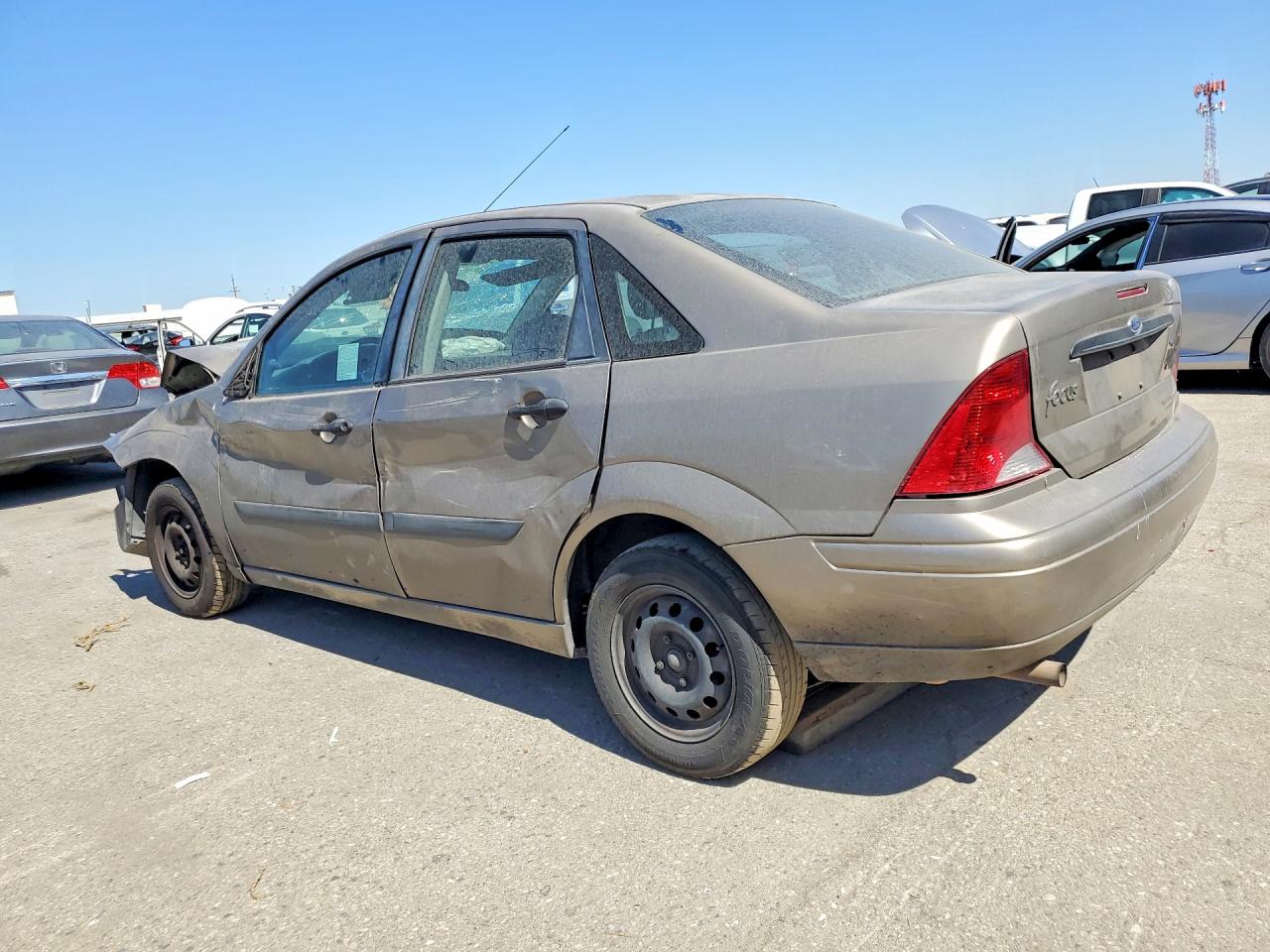 2004 Ford Focus Lx Gold vin: 1FAFP33Z44W188788