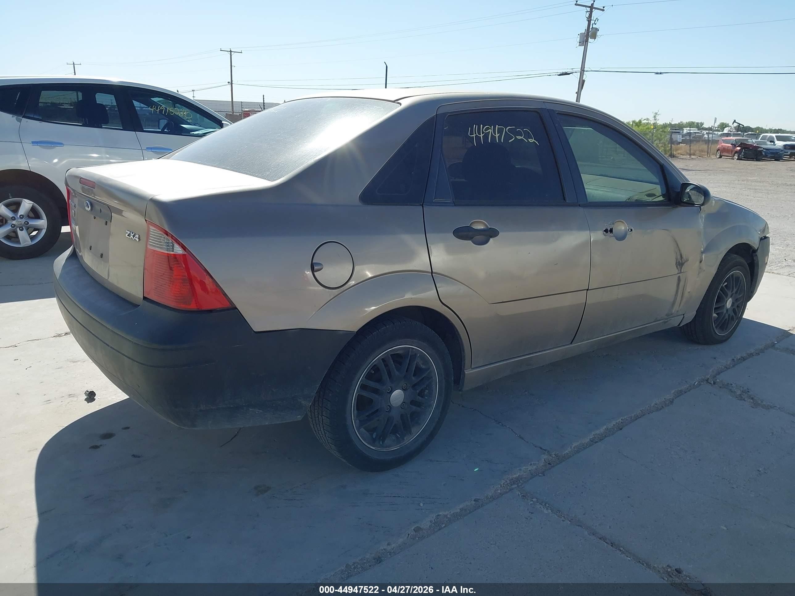 2005 Ford Focus Zx4 Tan vin: 1FAFP34N05W207253
