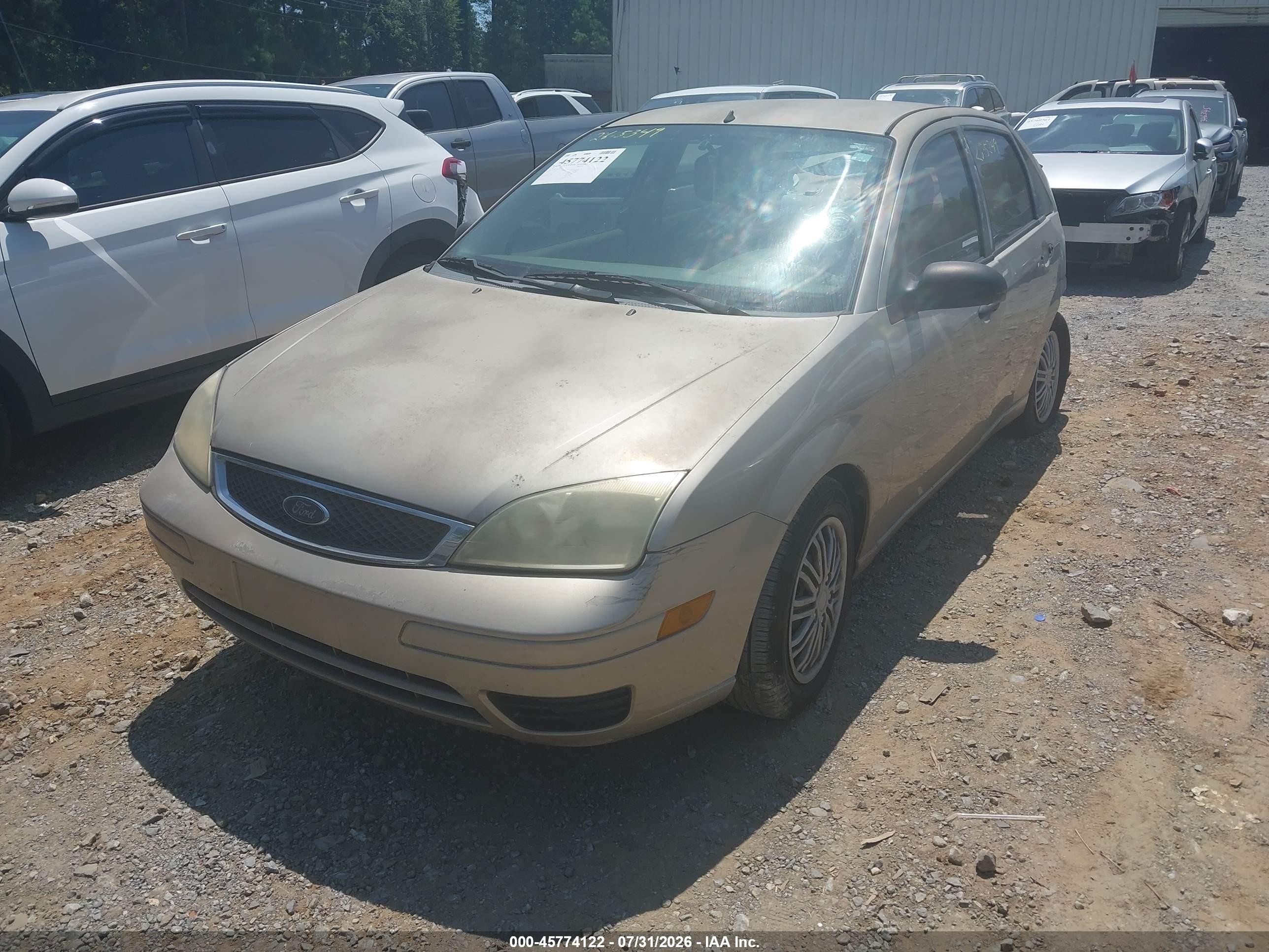 2007 Ford Focus S/se/ses Tan vin: 1FAFP34N17W362316