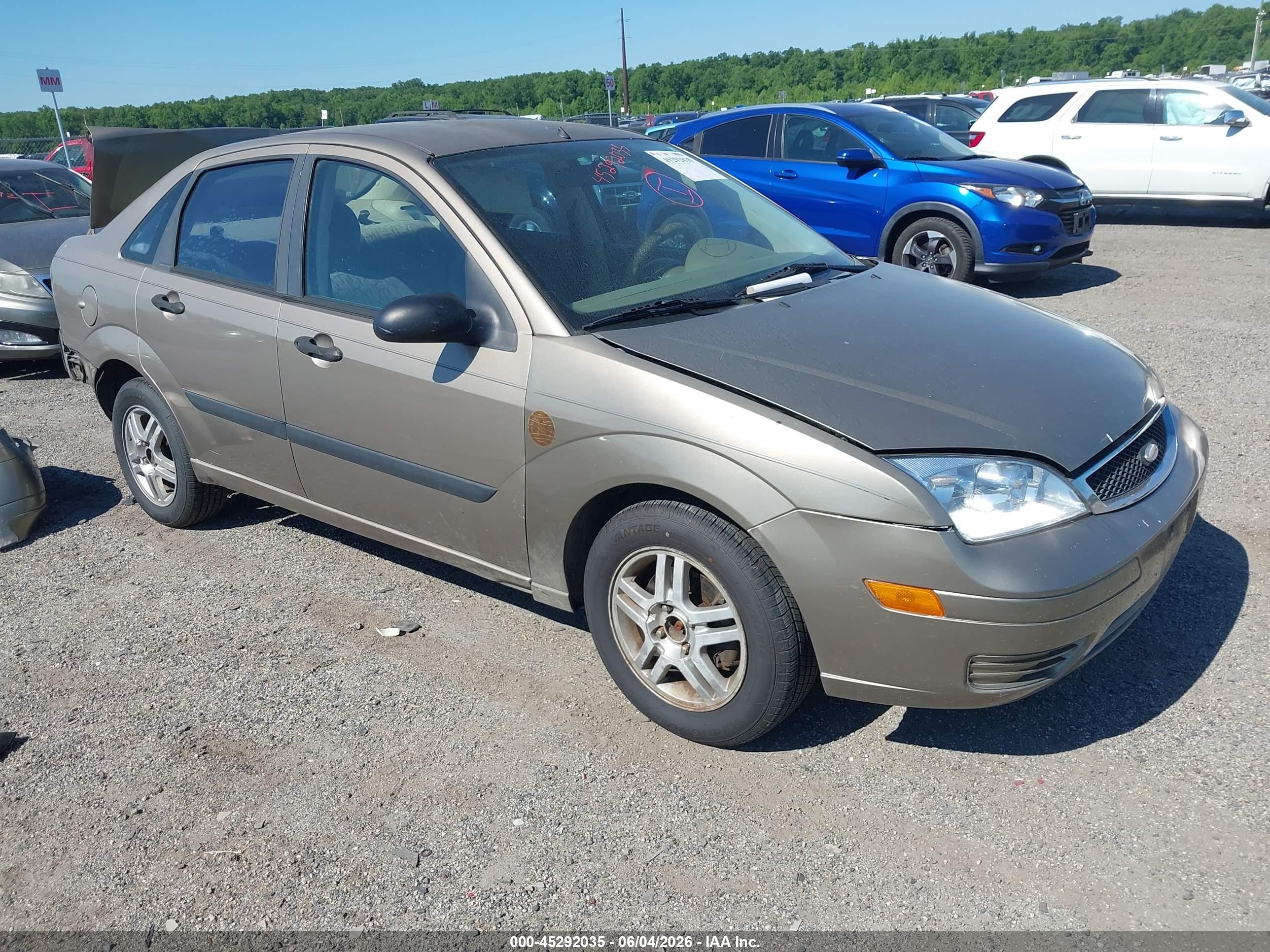 2005 Ford Focus Zx4 Champagne vin: 1FAFP34N35W111715