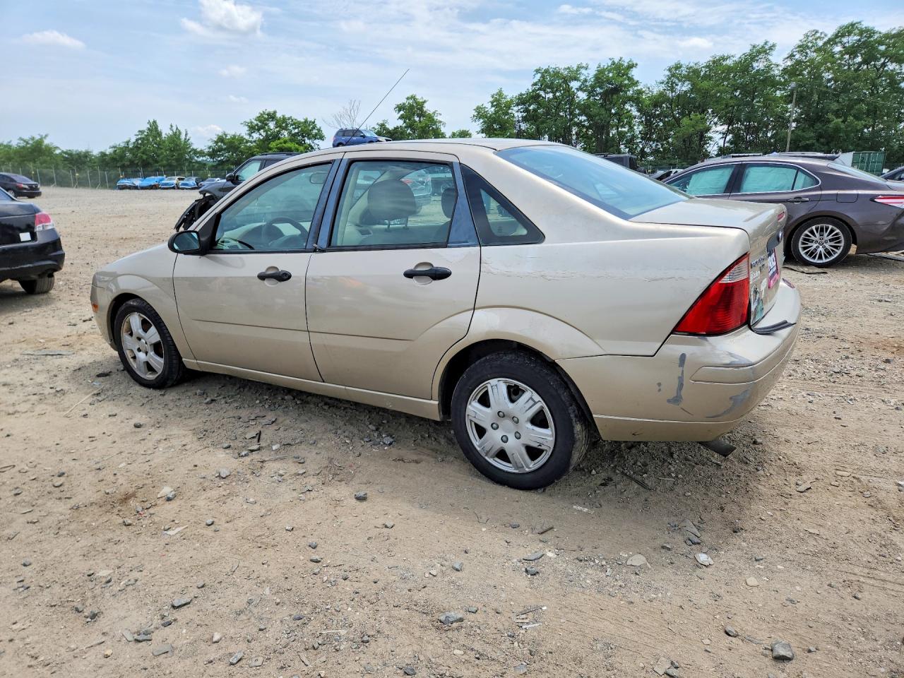 2007 Ford Focus Zx4 Tan vin: 1FAFP34N47W343923