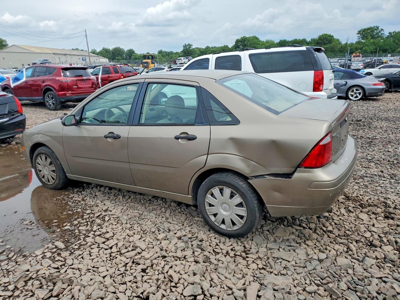 2005 Ford Focus Zx4 Tan vin: 1FAFP34N95W235696