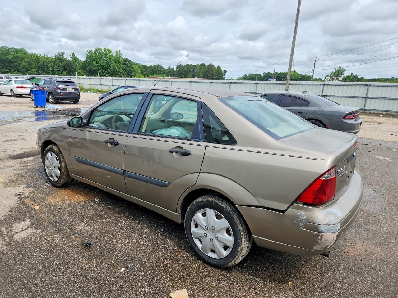 2005 Ford Focus Zx4 Tan vin: 1FAFP34N95W261571