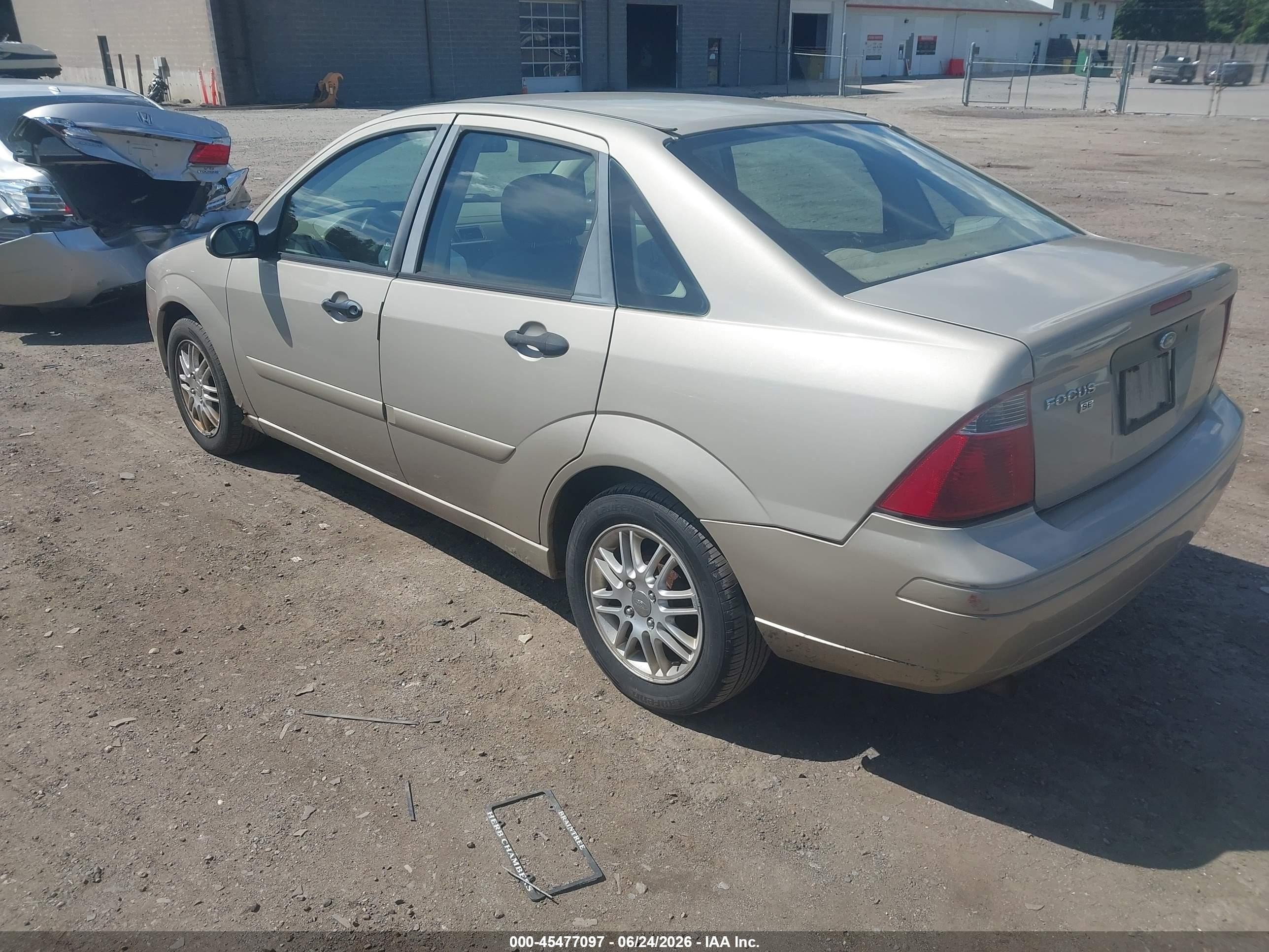2007 Ford Focus S/se/ses Tan vin: 1FAFP34N97W288370