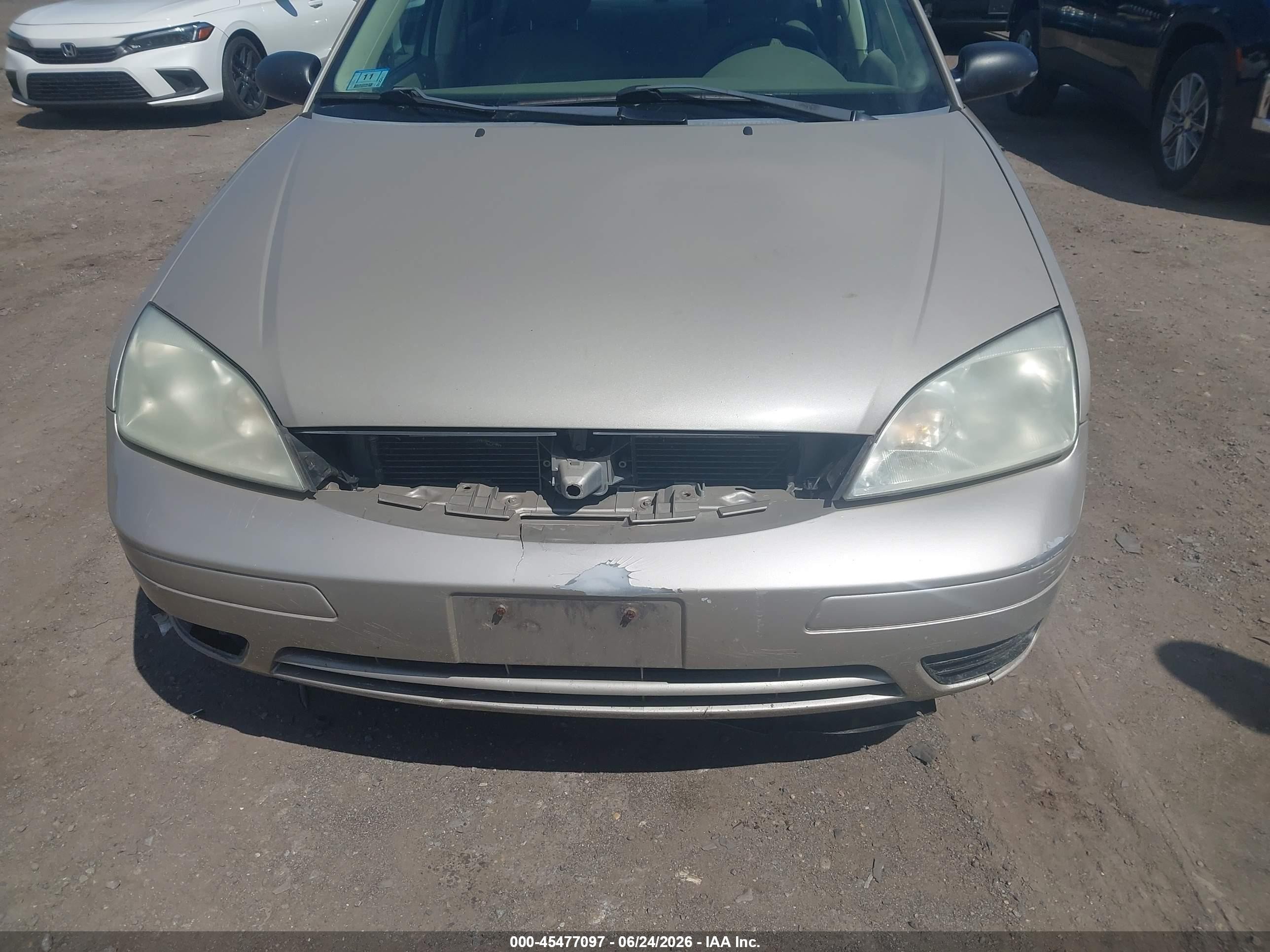 2007 Ford Focus S/se/ses Tan vin: 1FAFP34N97W288370