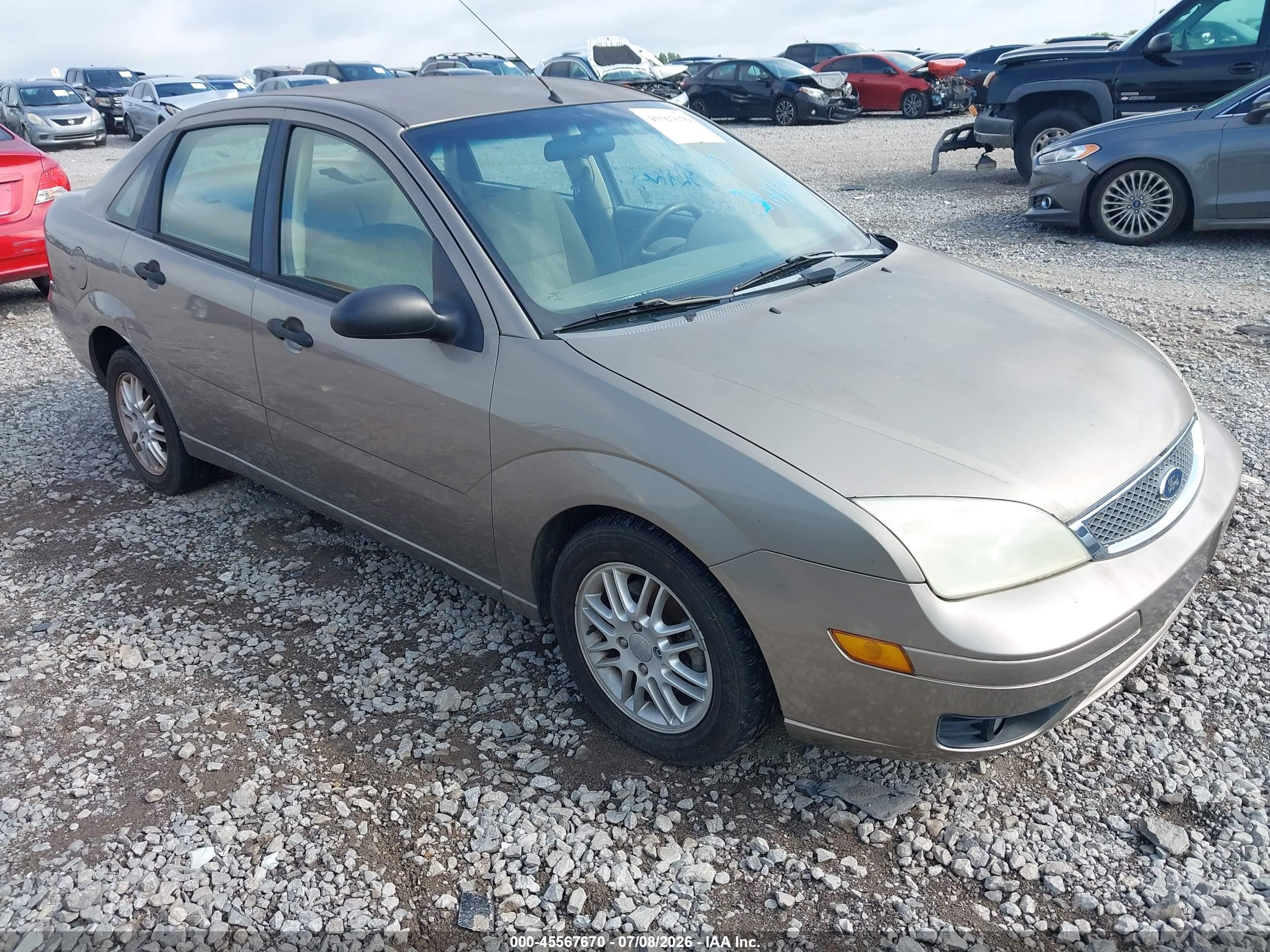 2005 Ford Focus Zx4 Champagne vin: 1FAFP34NX5W200147