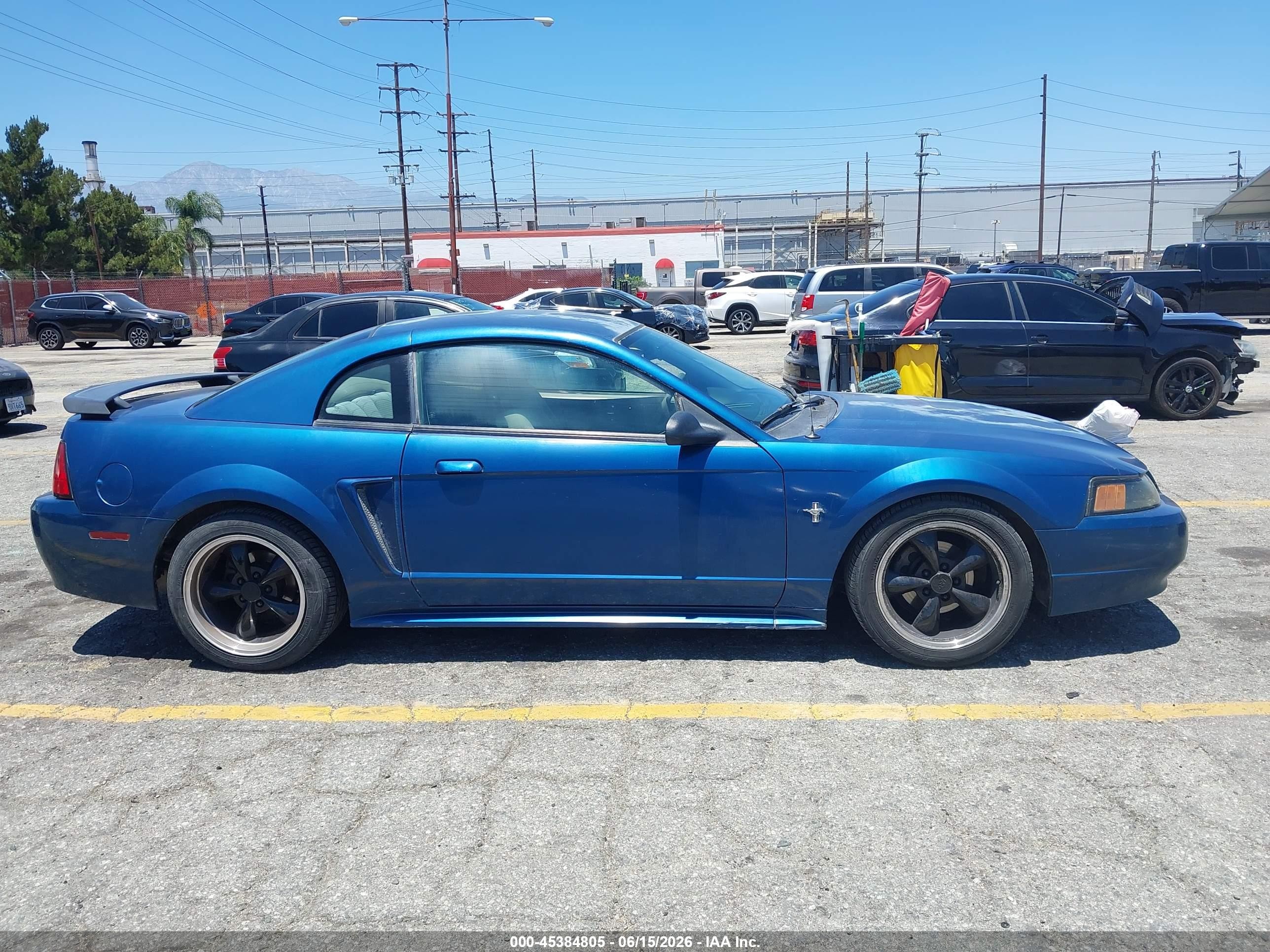 2000 Ford Mustang   Blue vin: 1FAFP4040YF178084