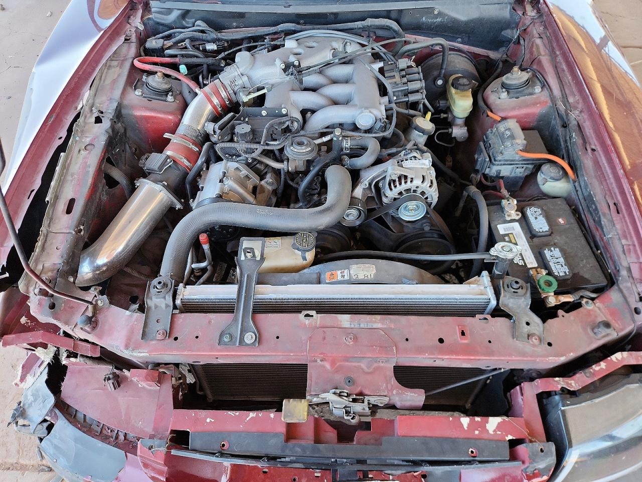 2004 Ford Mustang Burgundy vin: 1FAFP40414F115599