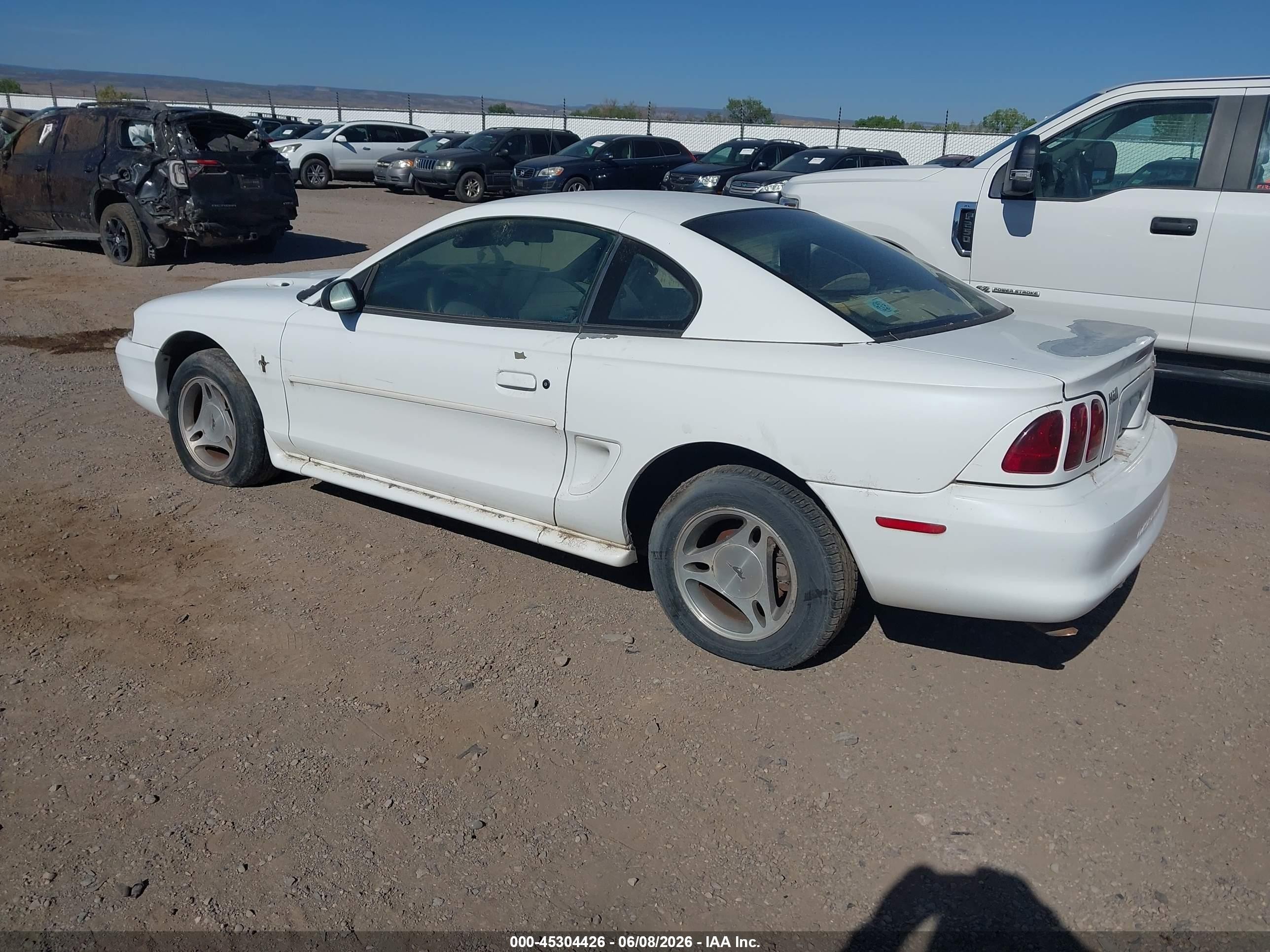 1998 Ford Mustang   White vin: 1FAFP4041WF198082