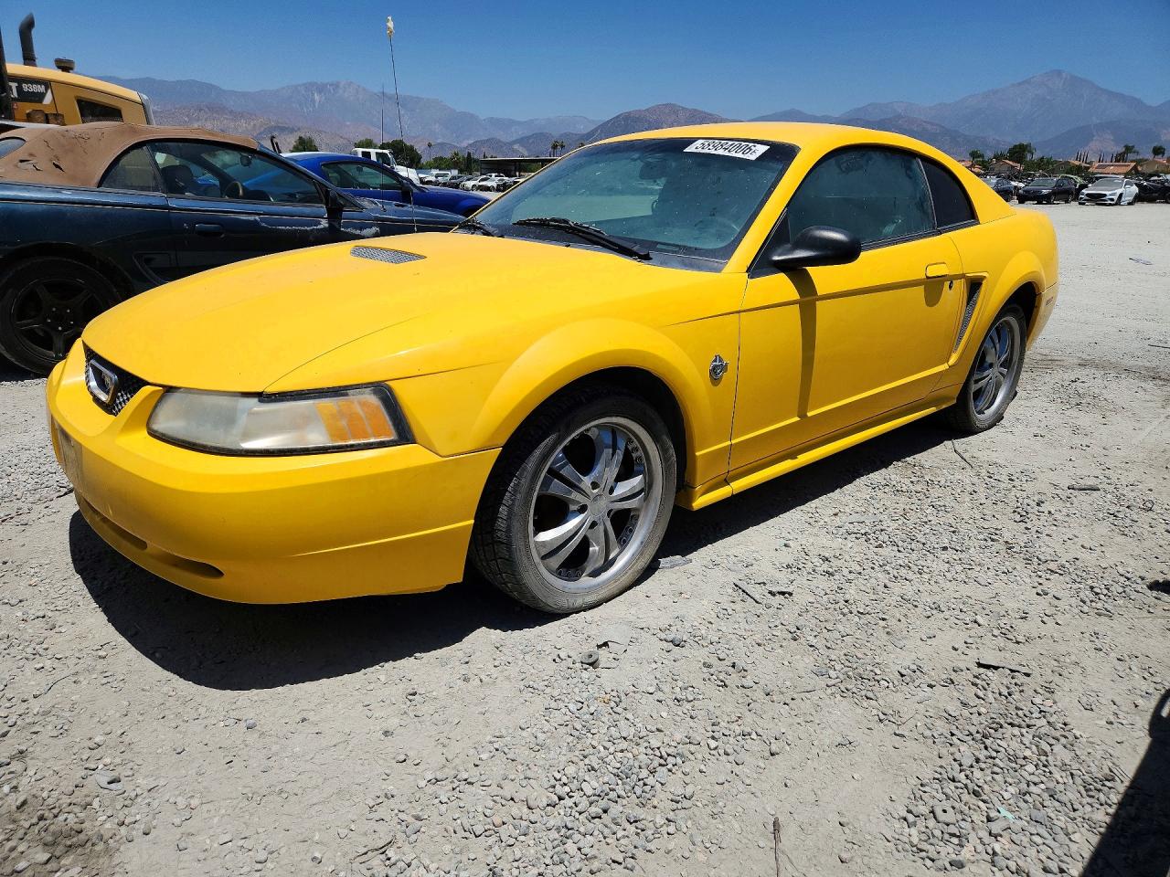 1999 Ford Mustang Желтый vin: 1FAFP4041XF235259