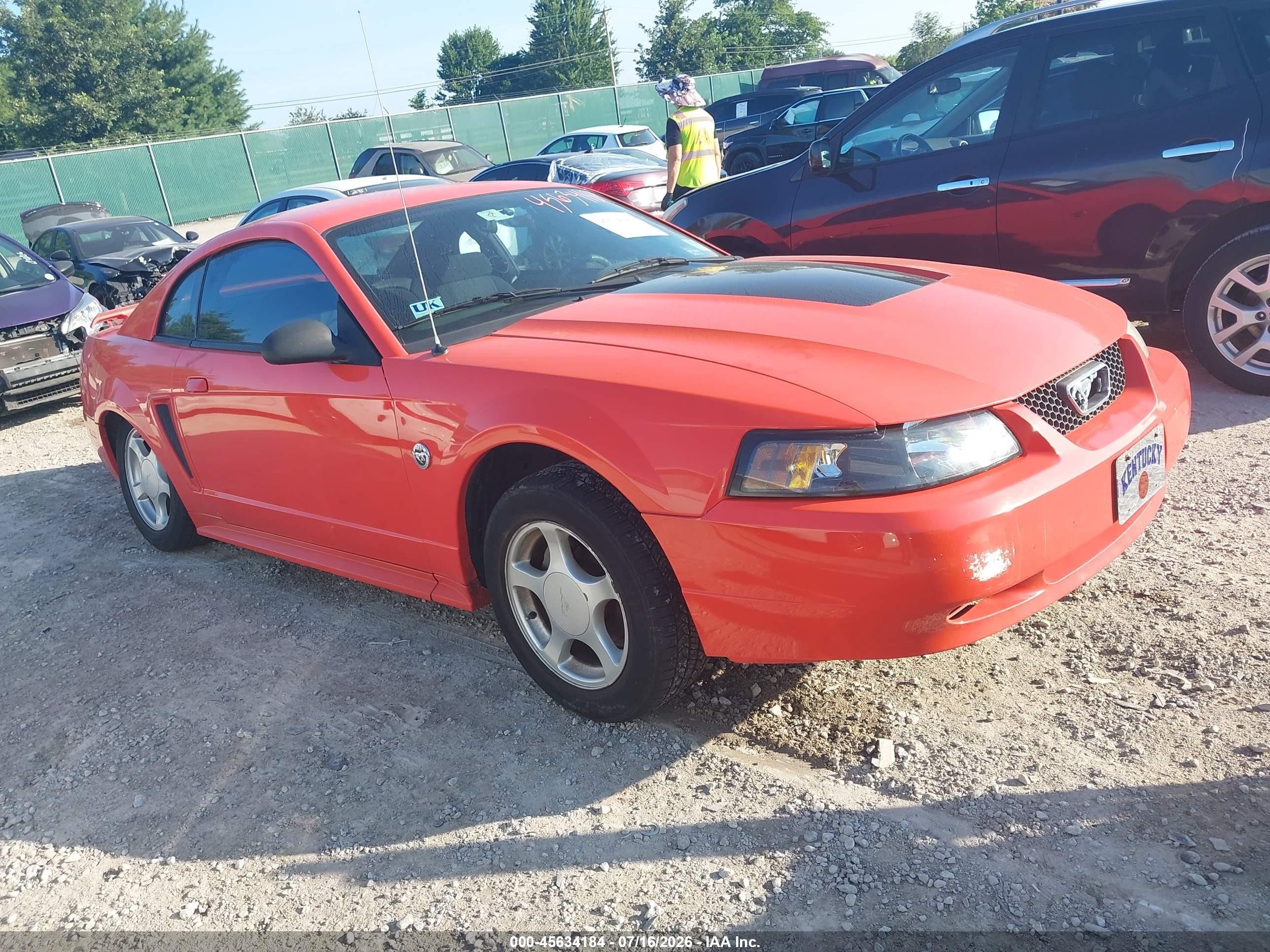 2004 Ford Mustang   Orange vin: 1FAFP40434F121811