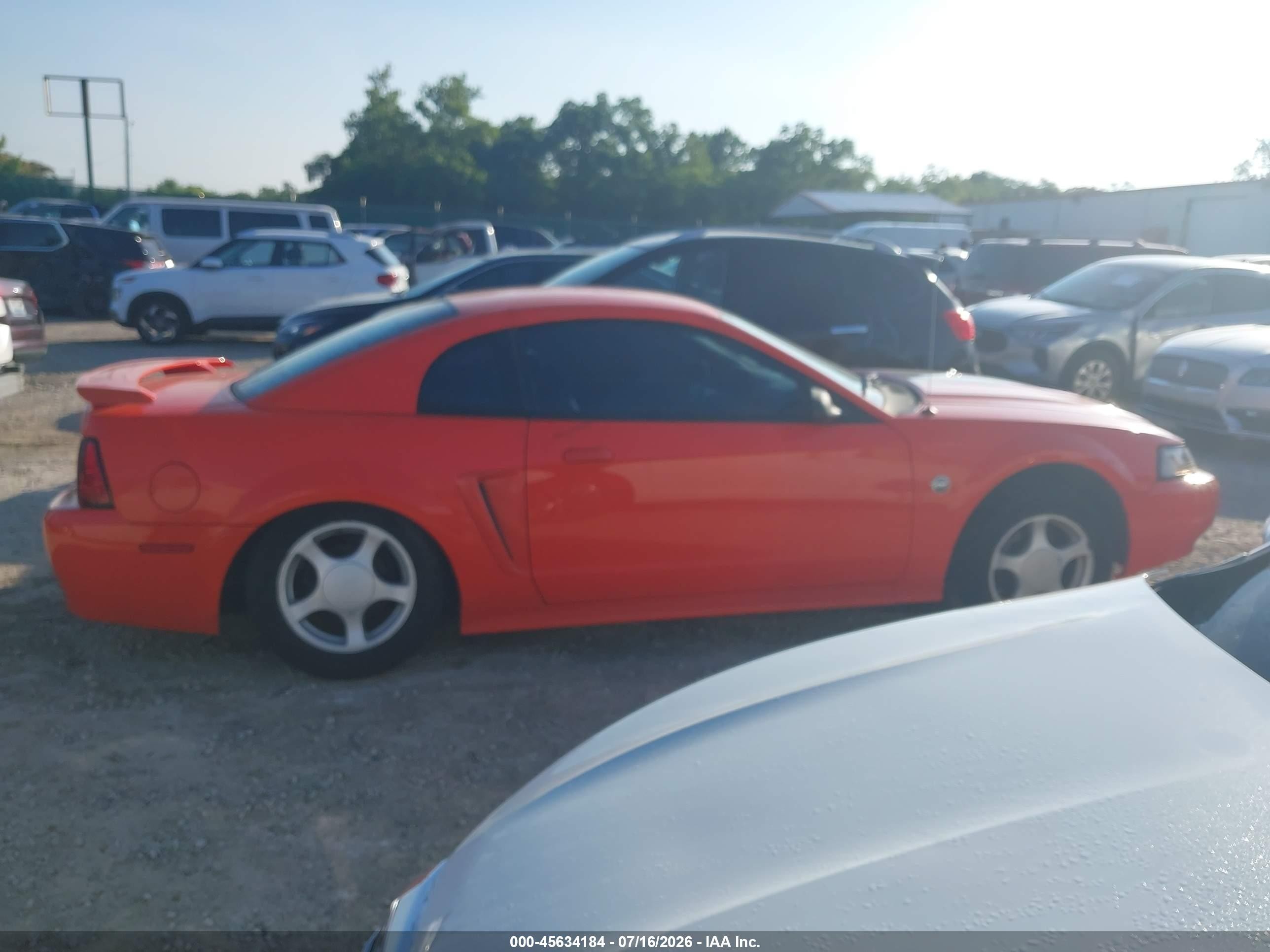 2004 Ford Mustang   Orange vin: 1FAFP40434F121811