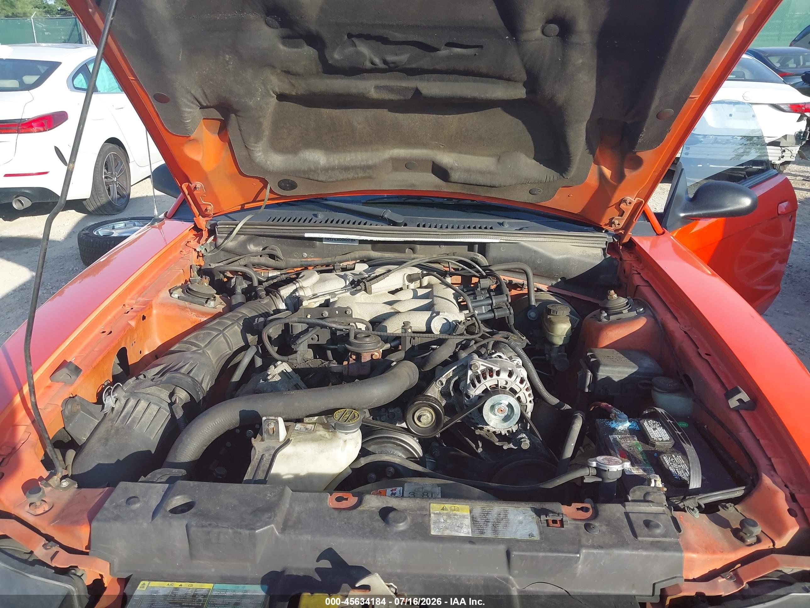 2004 Ford Mustang   Orange vin: 1FAFP40434F121811