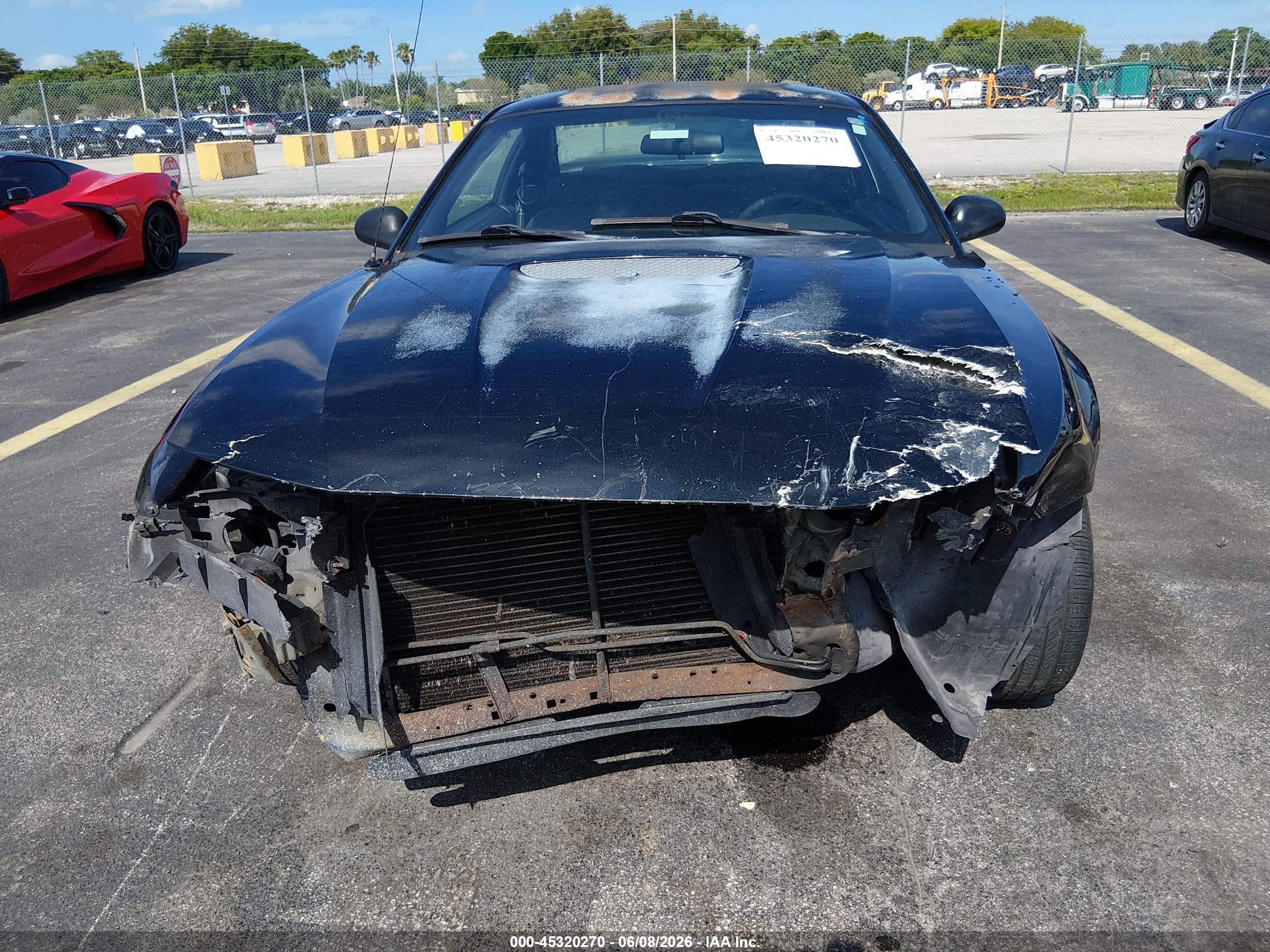 2002 Ford Mustang Deluxe Black vin: 1FAFP40452F111570