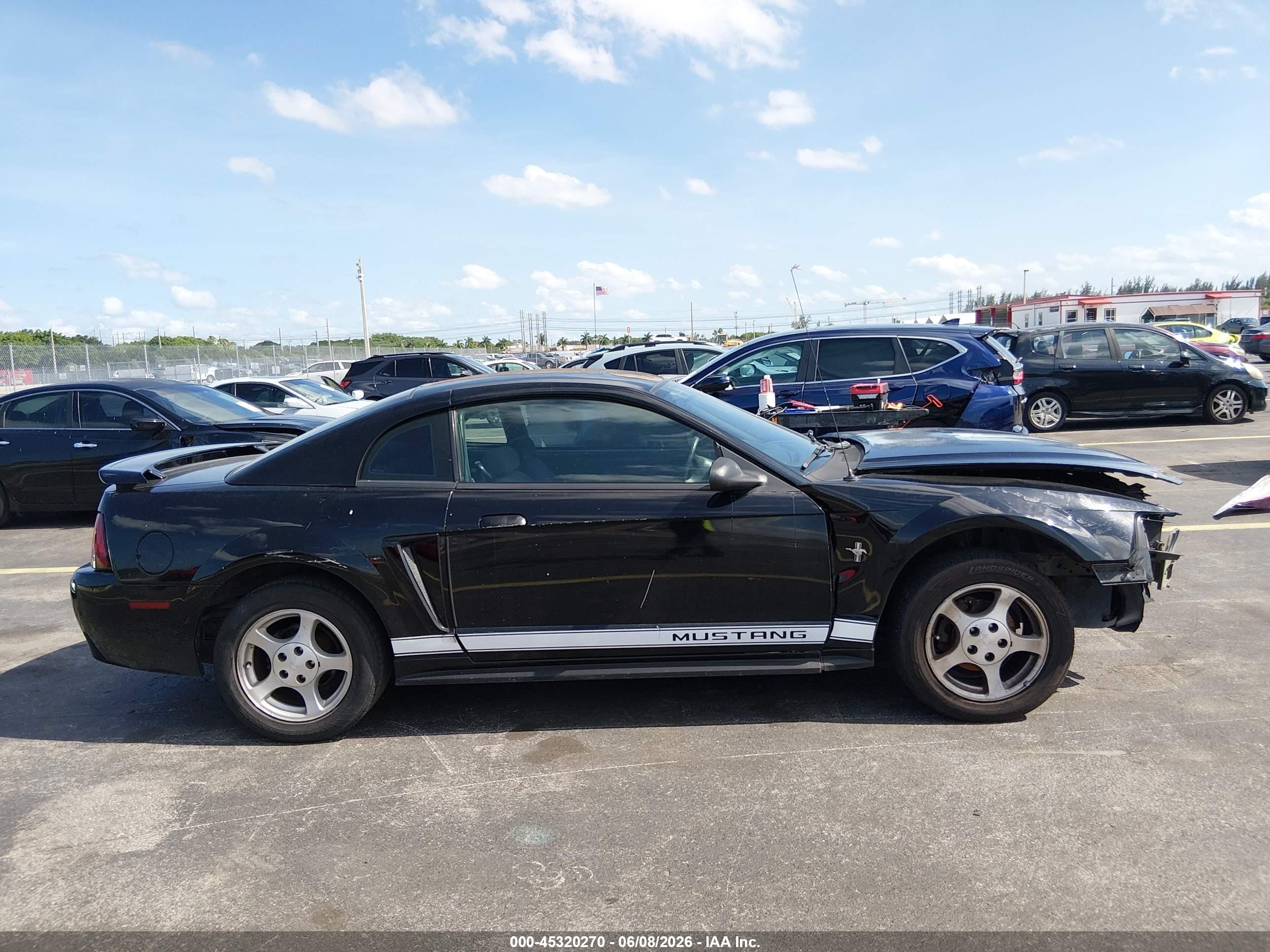 2002 Ford Mustang Deluxe Black vin: 1FAFP40452F111570