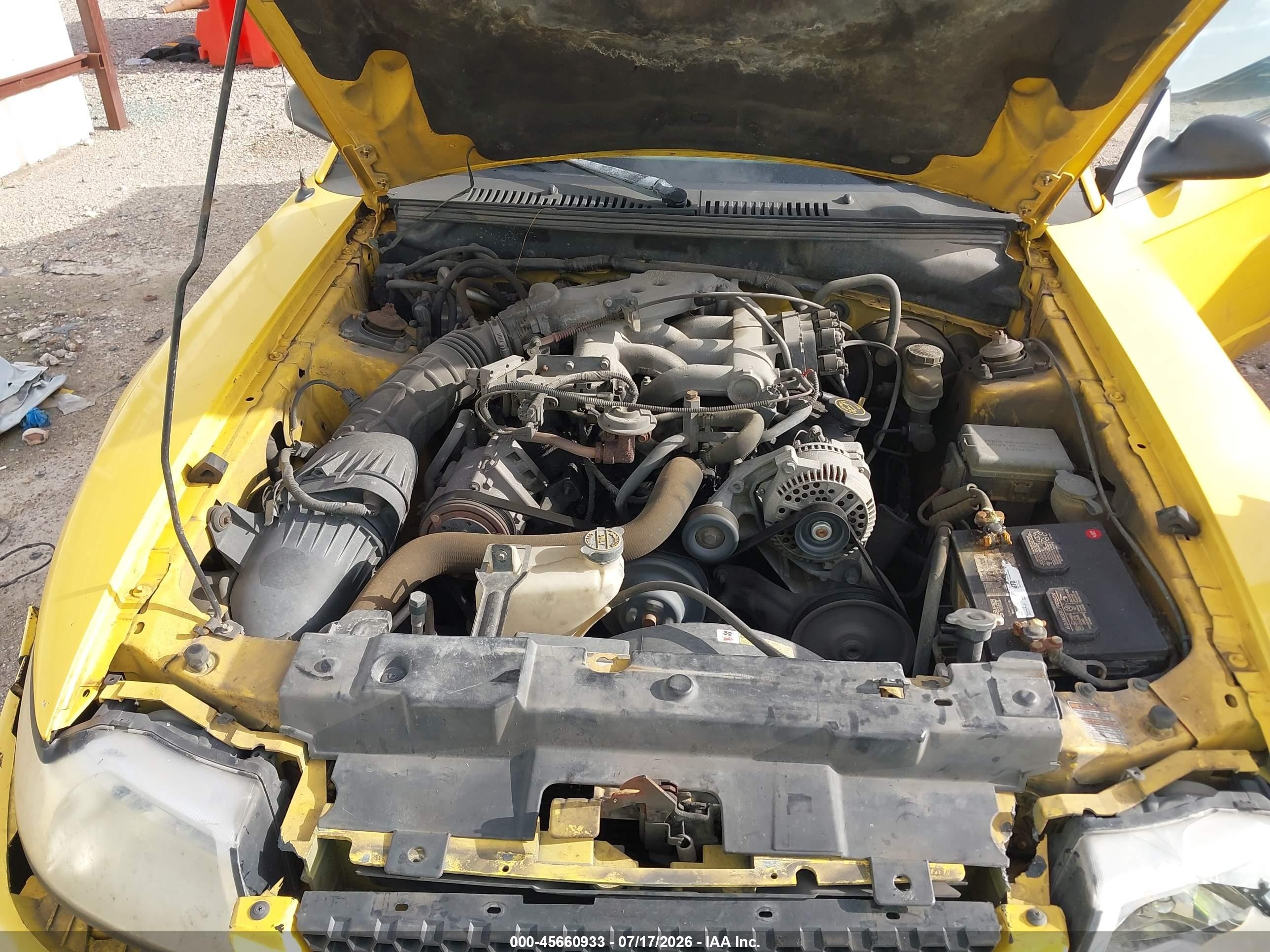 1999 Ford Mustang   Желтый vin: 1FAFP4048XF183211