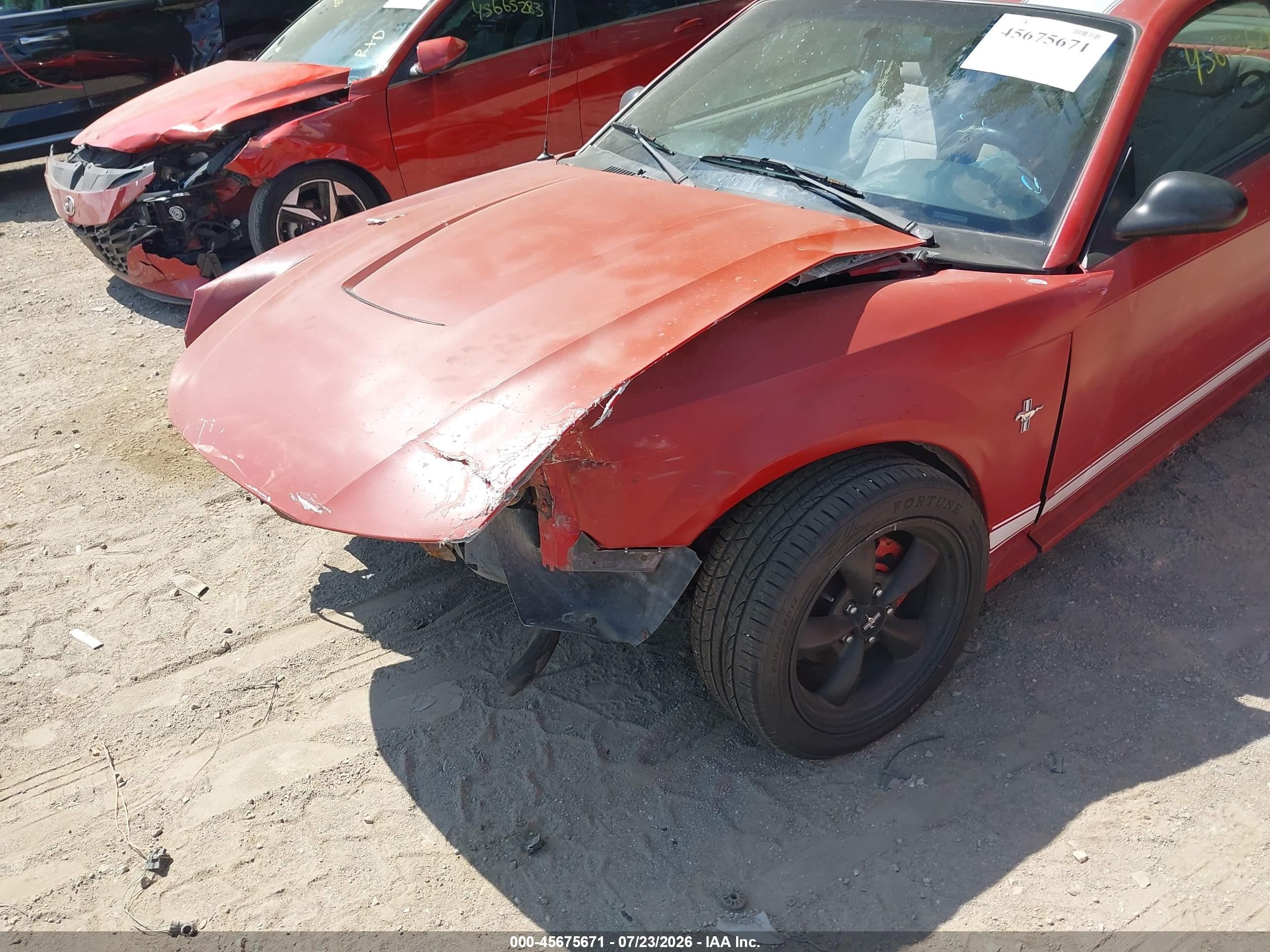 1999 Ford Mustang   Red vin: 1FAFP4049XF132199