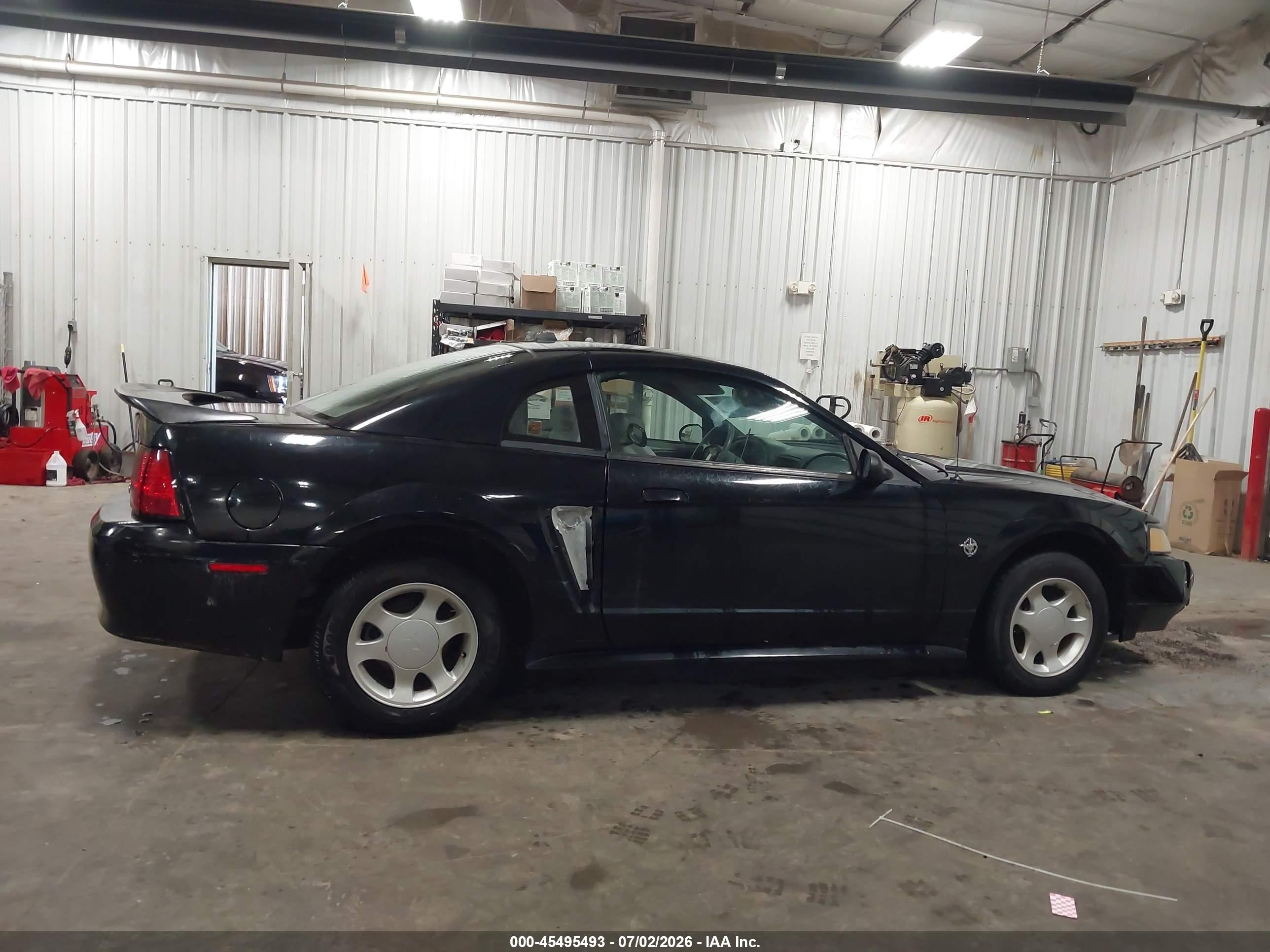 1999 Ford Mustang   Black vin: 1FAFP4049XF222002